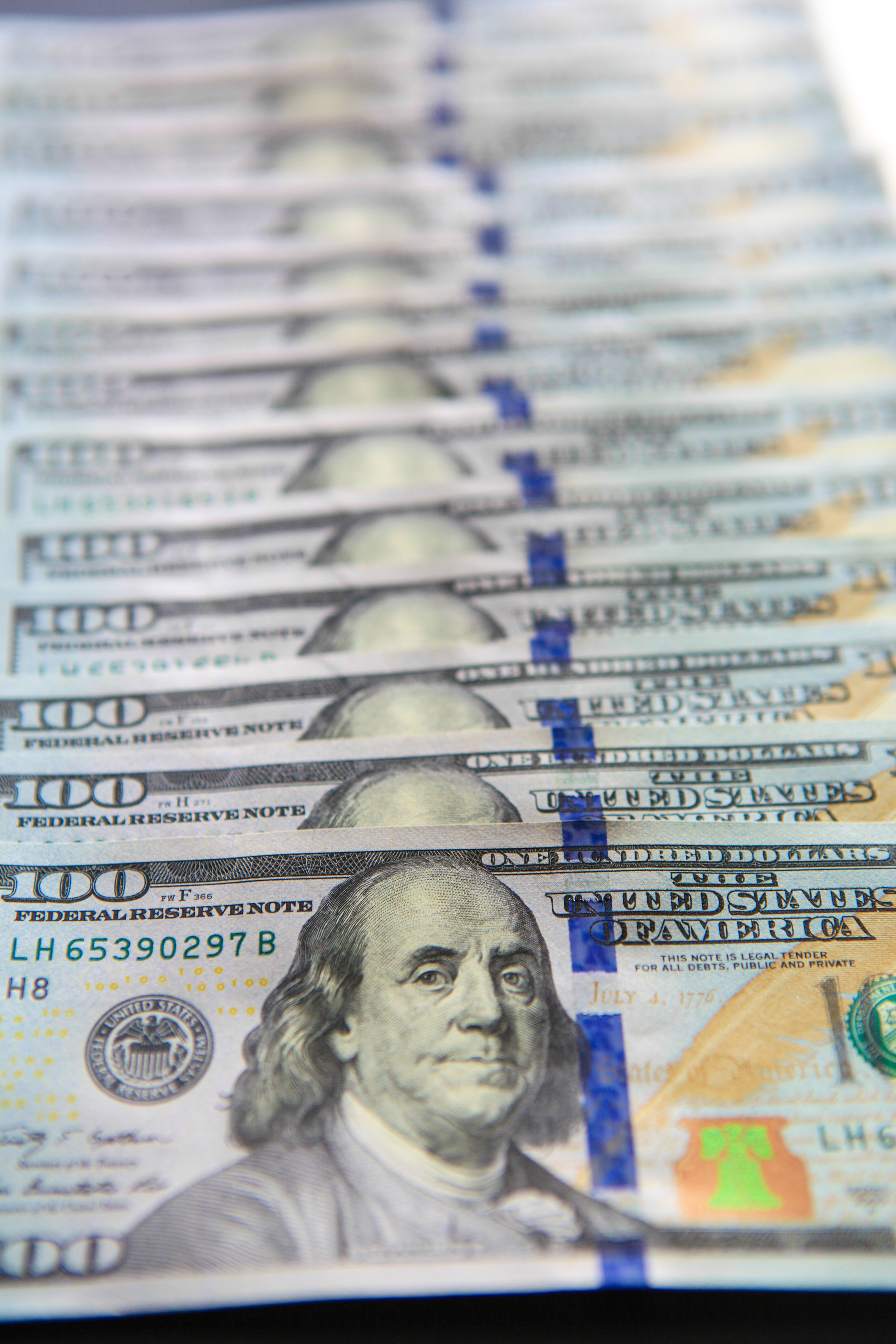 100 dollar bills close-up photo
