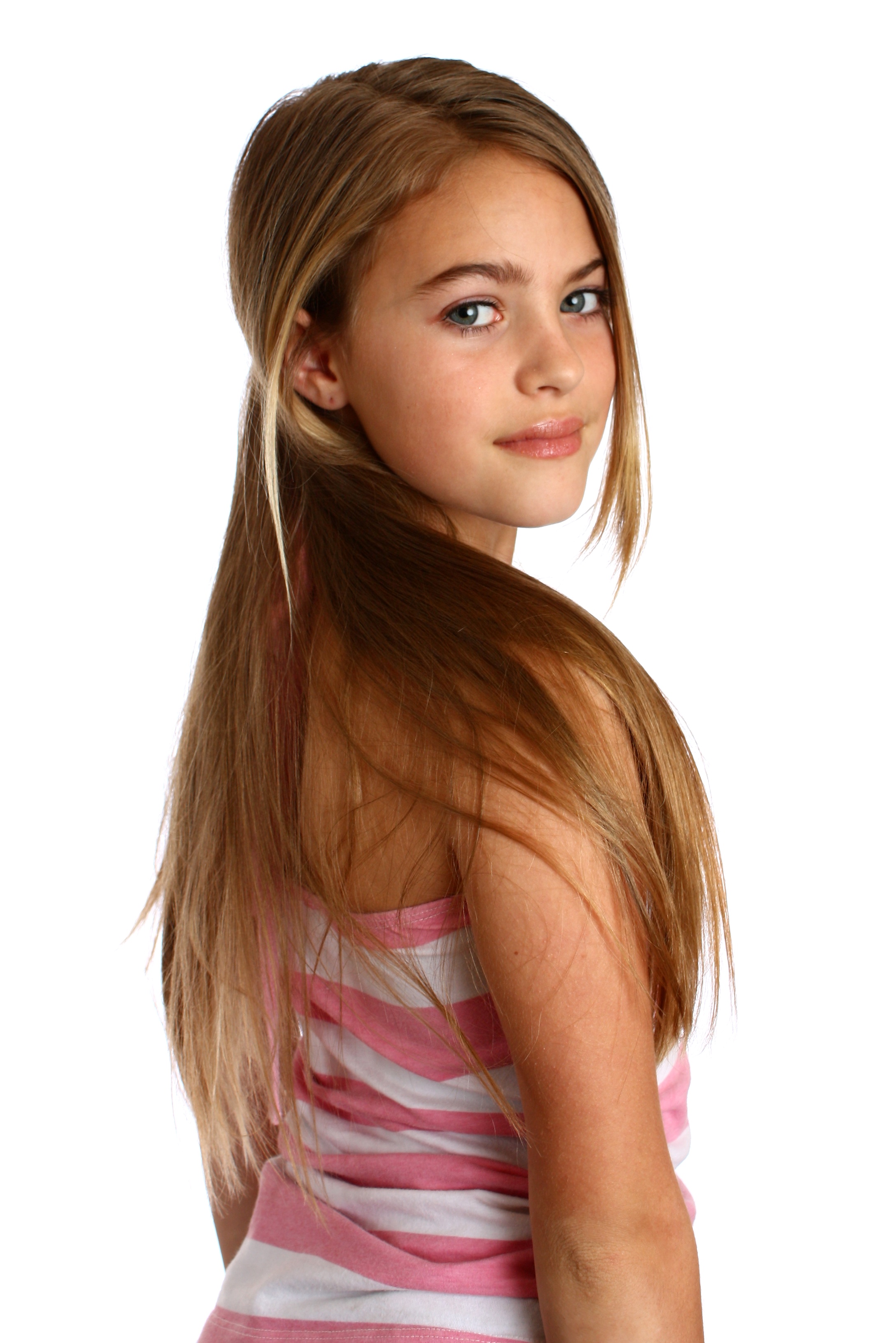 A beautiful young girl posing on white photo