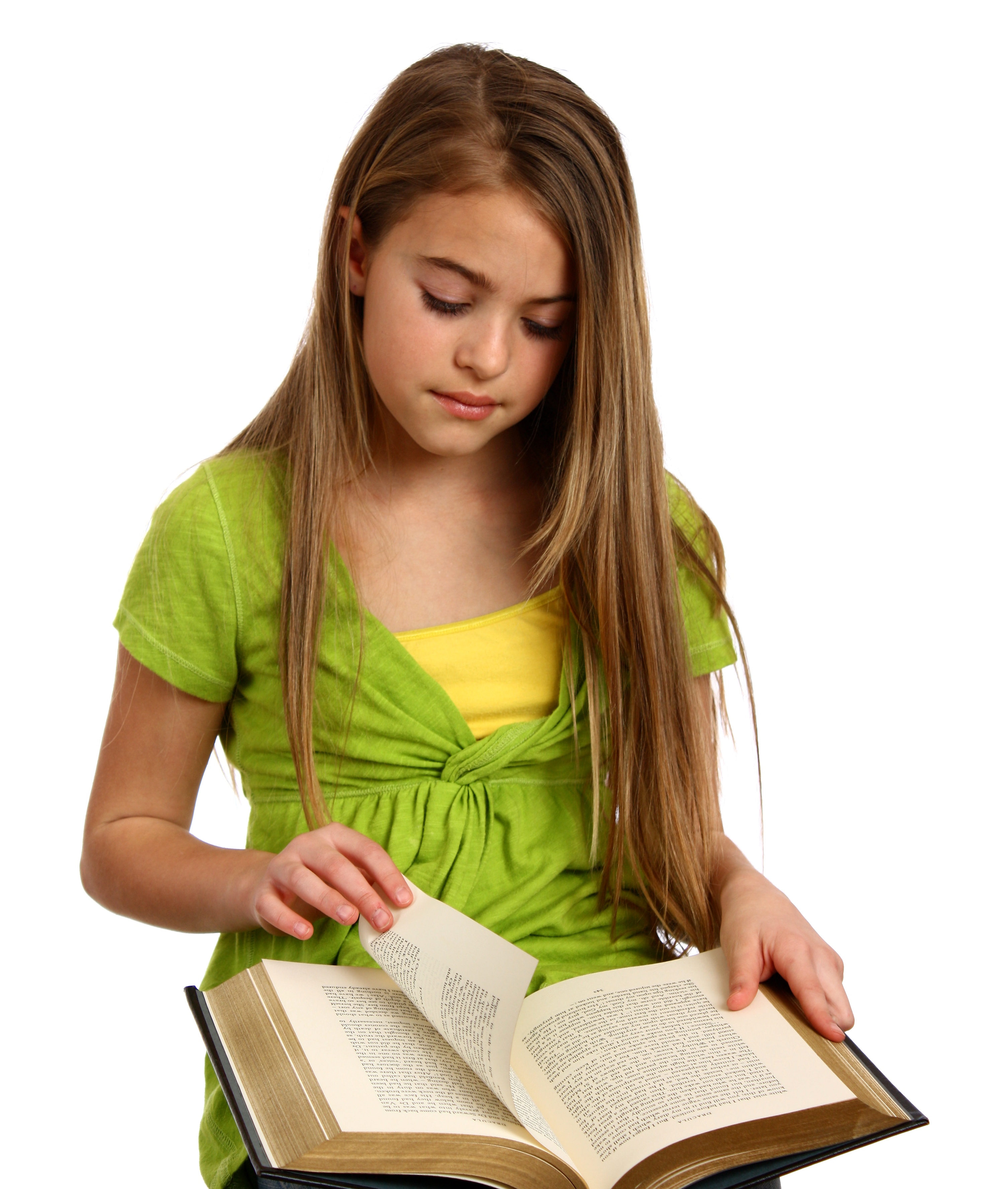 A beautiful young girl reading a book photo