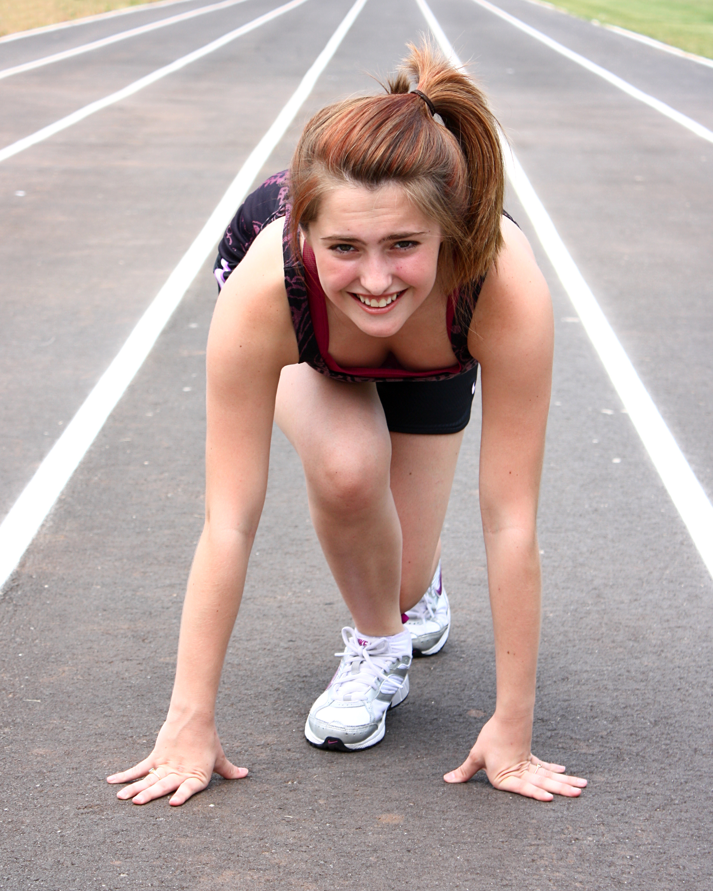 A cute young girl on a track field, Beautiful, Cute, Exercise, Female, HQ Photo