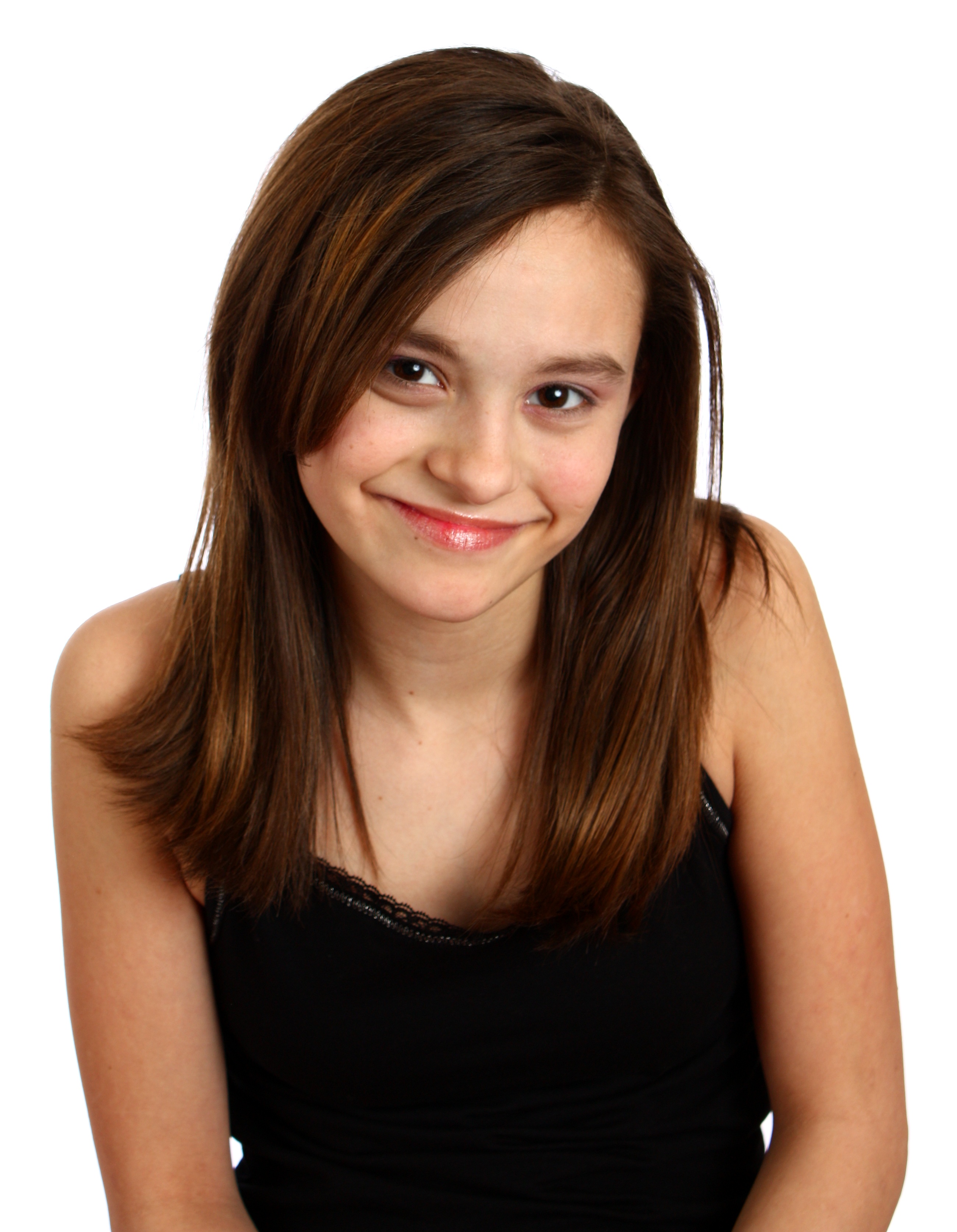 A cute young girl posing on white photo