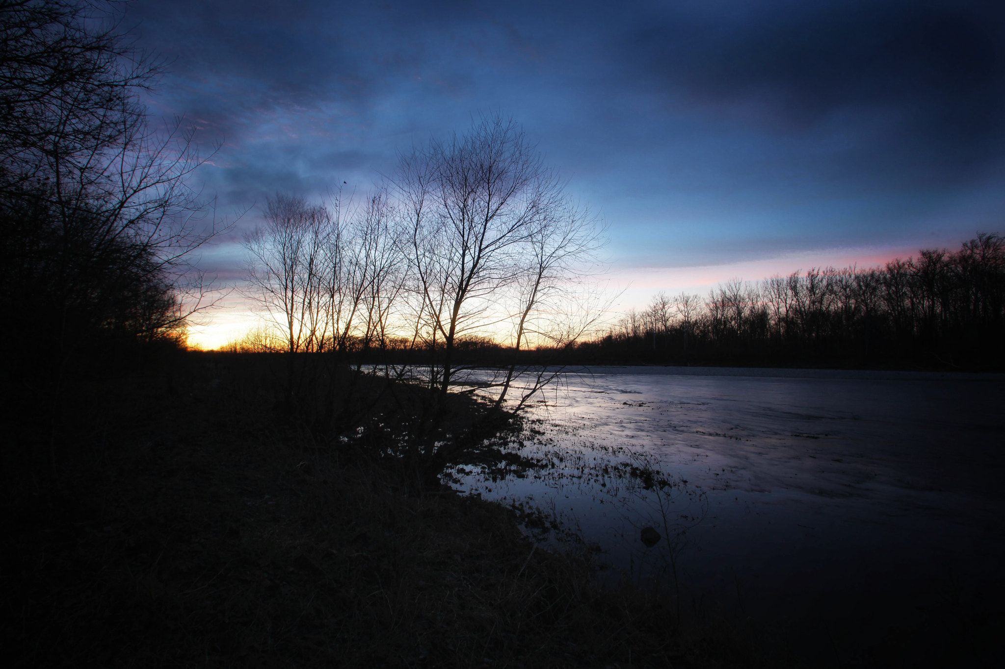 Authentic - Fading winter sunset light over Great Miami River near ...