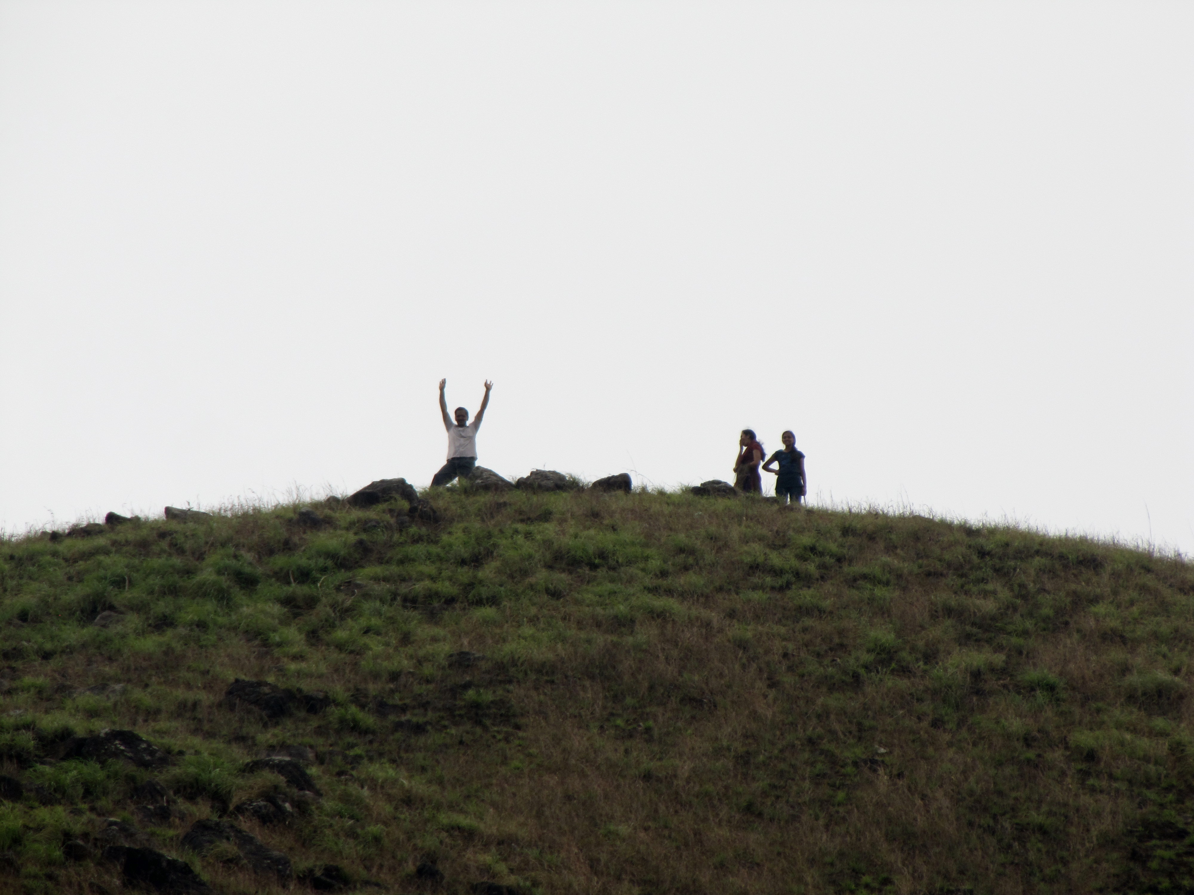 File:People enjoying after reaching the Ranipuram hill top.jpg ...