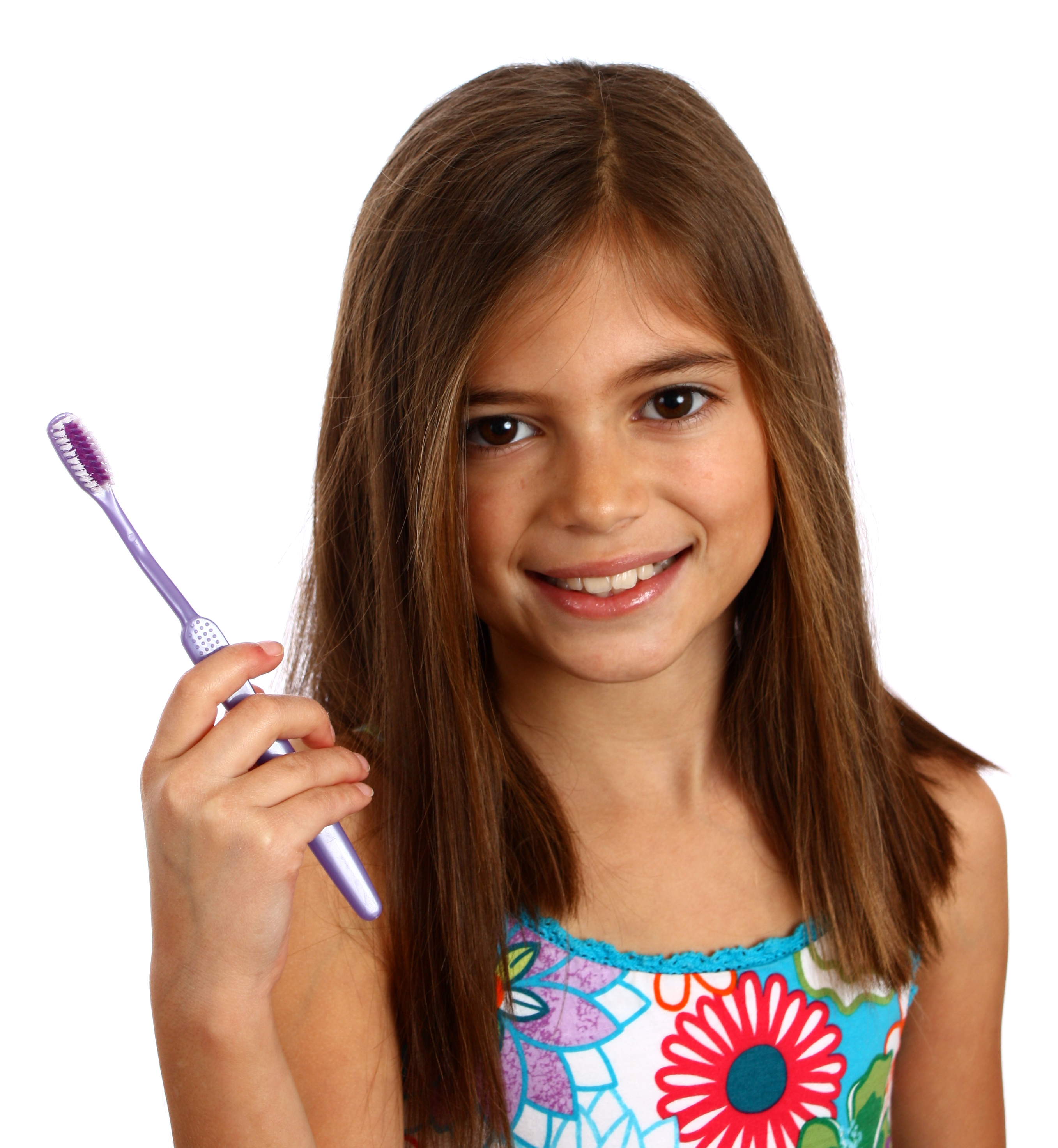 A pretty young girl holding a toothbrush photo