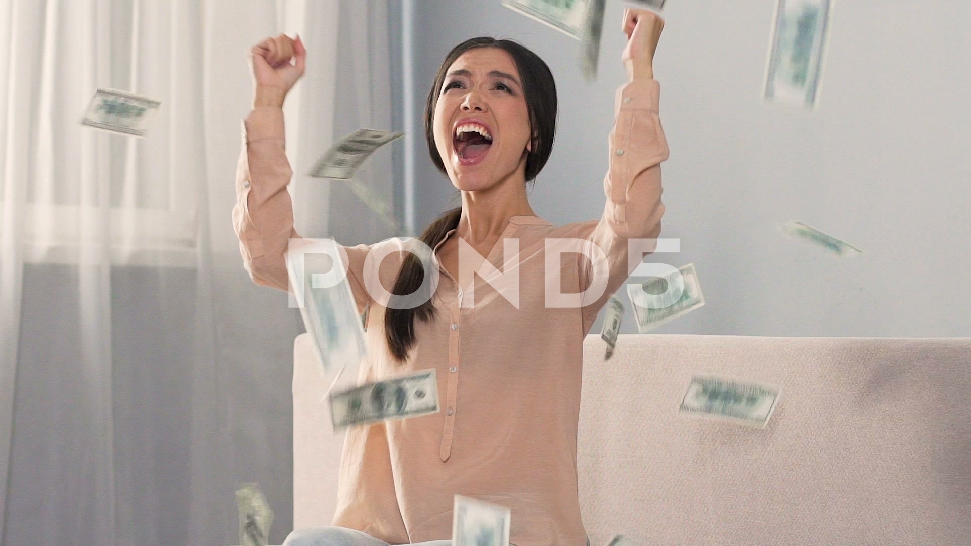 Girl sincerely rejoicing money falling from sky, winning lottery ...