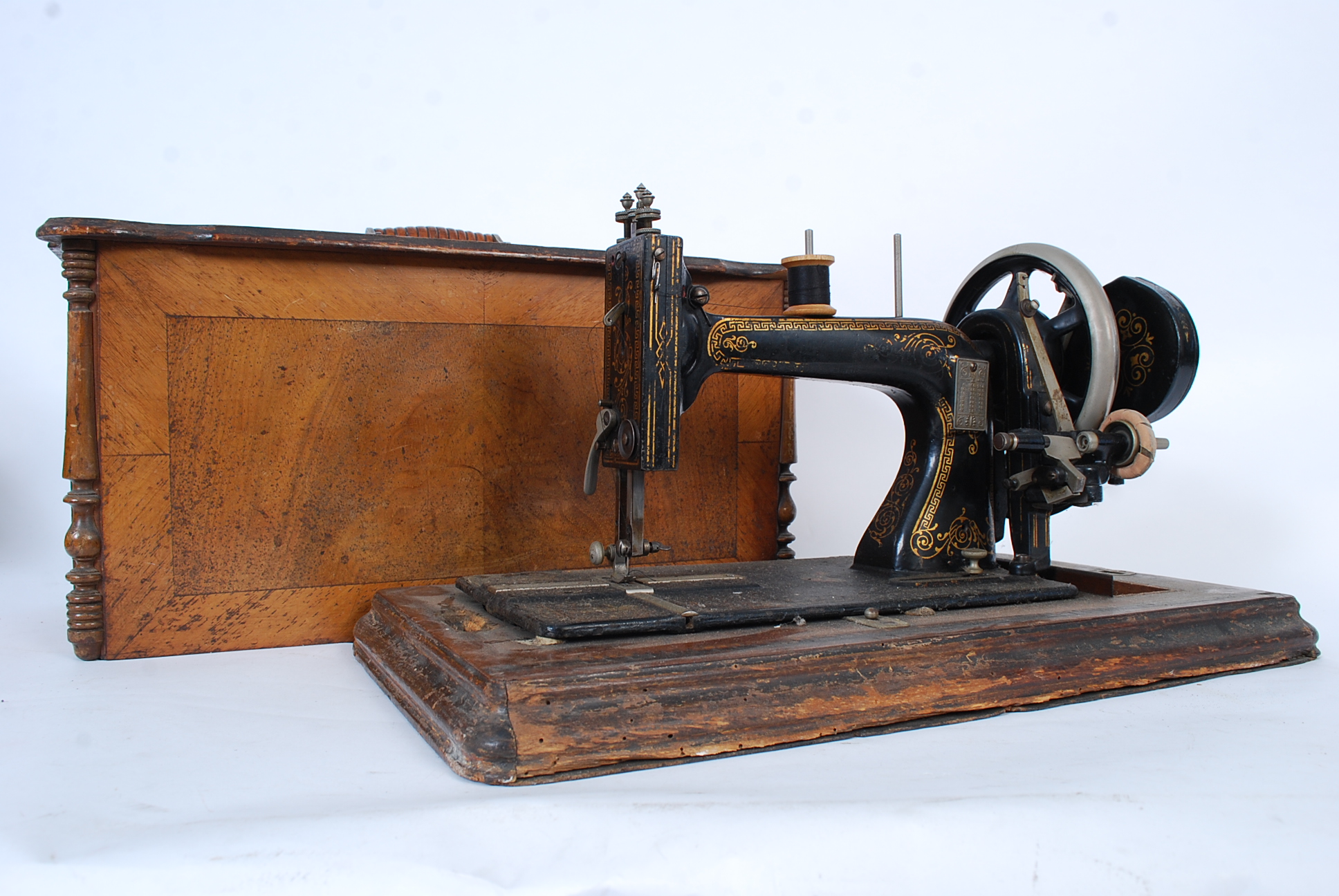 A vintage sewing machine from the 19th century. 