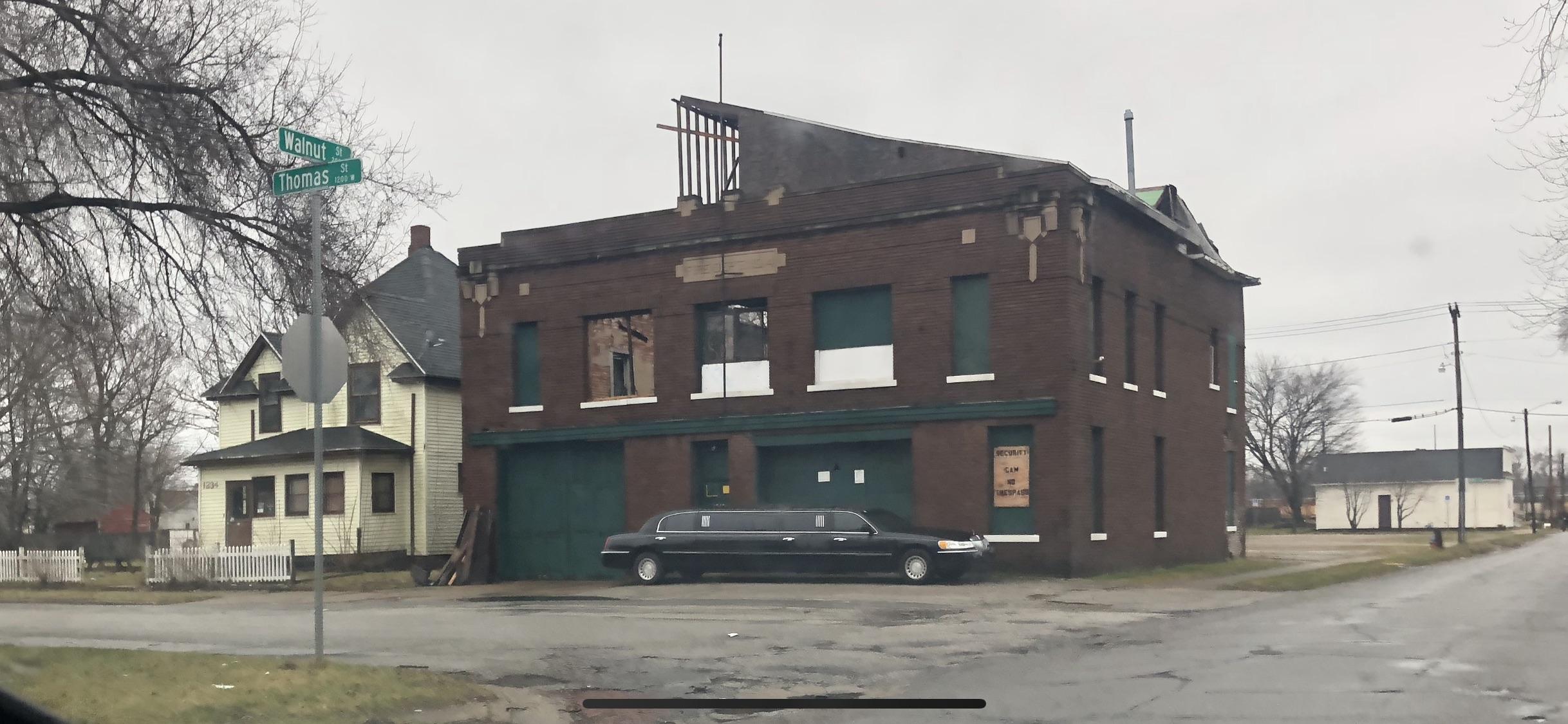This limo in front of an abandoned building : mildlyinteresting