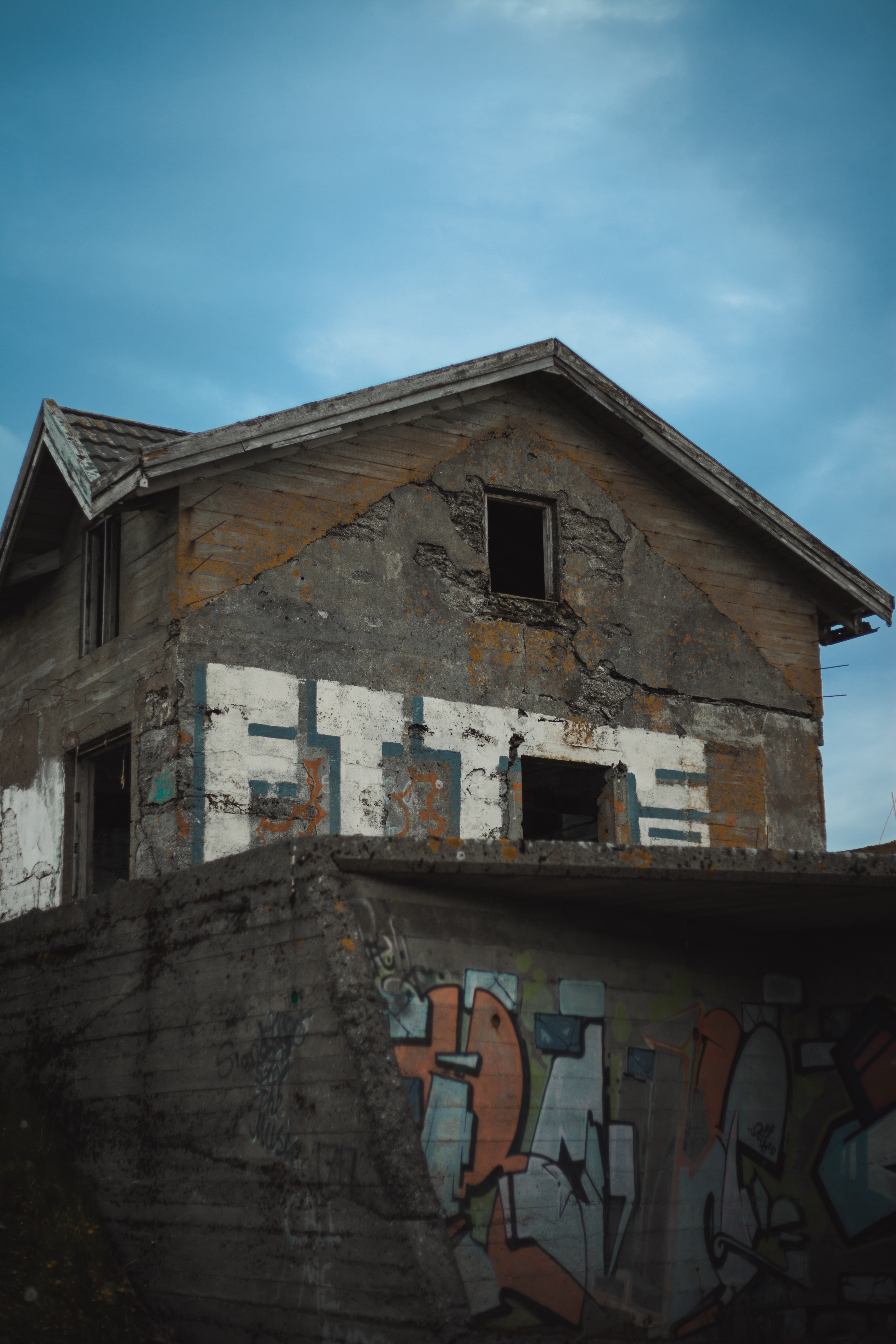 Abandoned house with graffiti photo