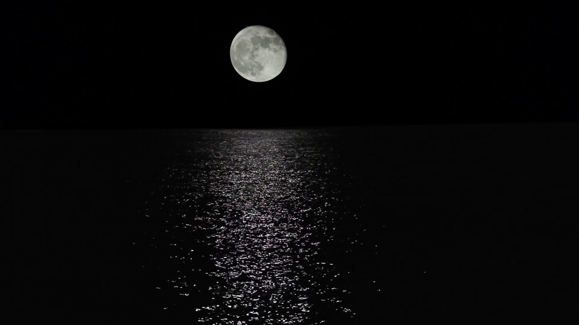 Moonlight path with low fool moon above the sea Stock Video Footage ...