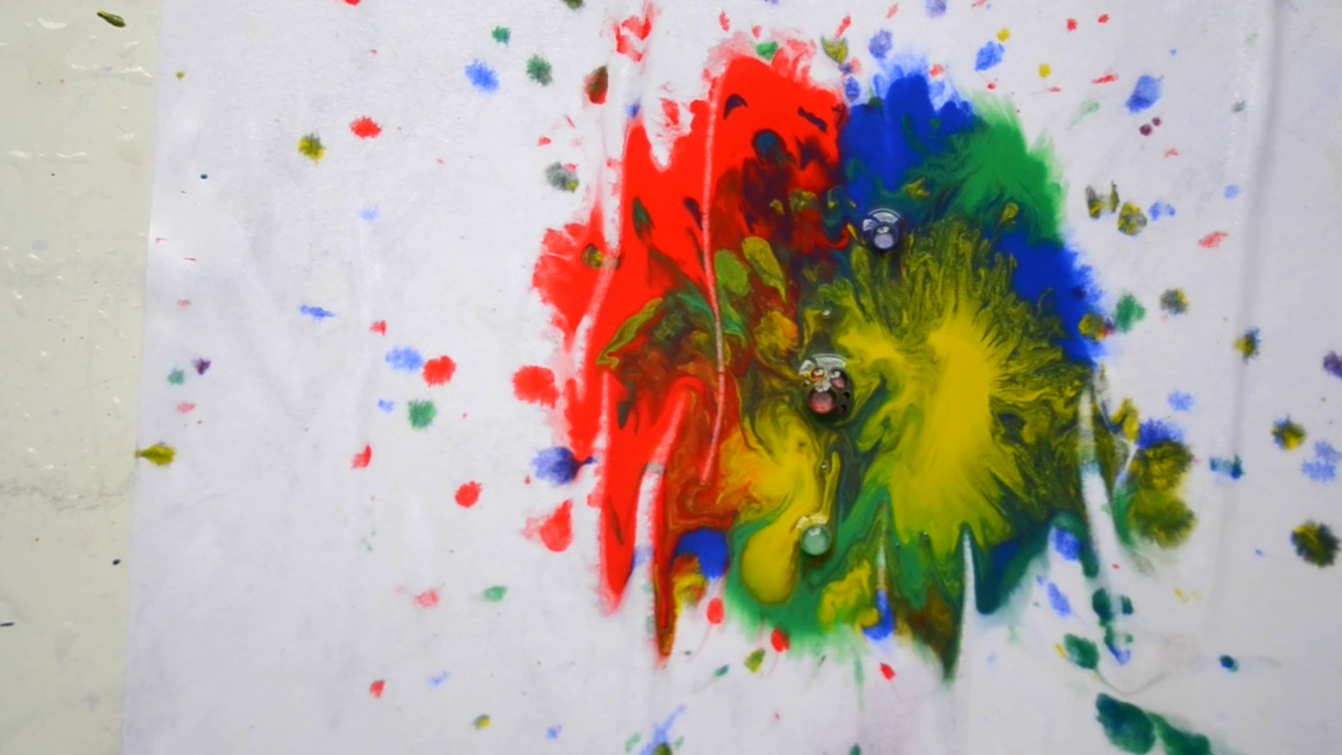 HD 1080 Drops of paint of different red, blue, green, yellow colors ...