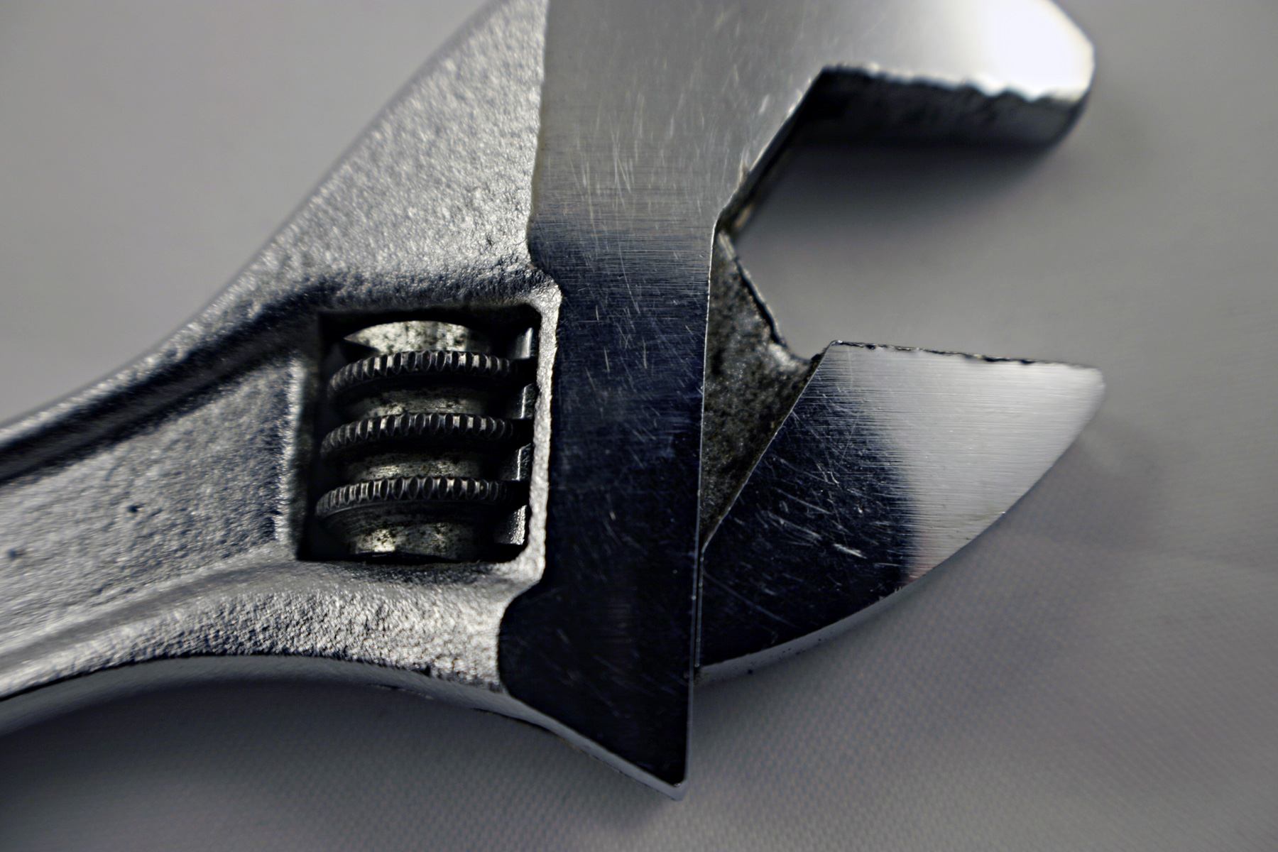 Adjustable steel wrench closeup photo