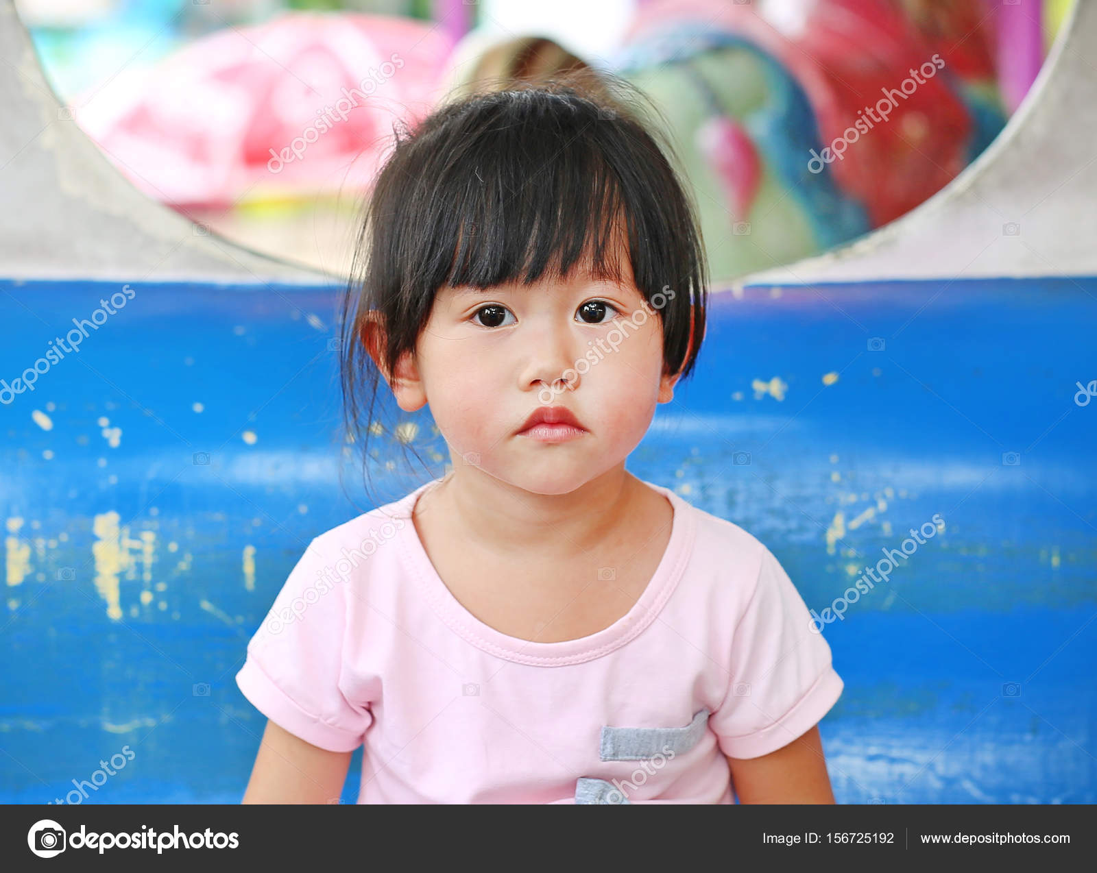 Happy adorable kid girl on a carriage in a carousel — Stock Photo ...