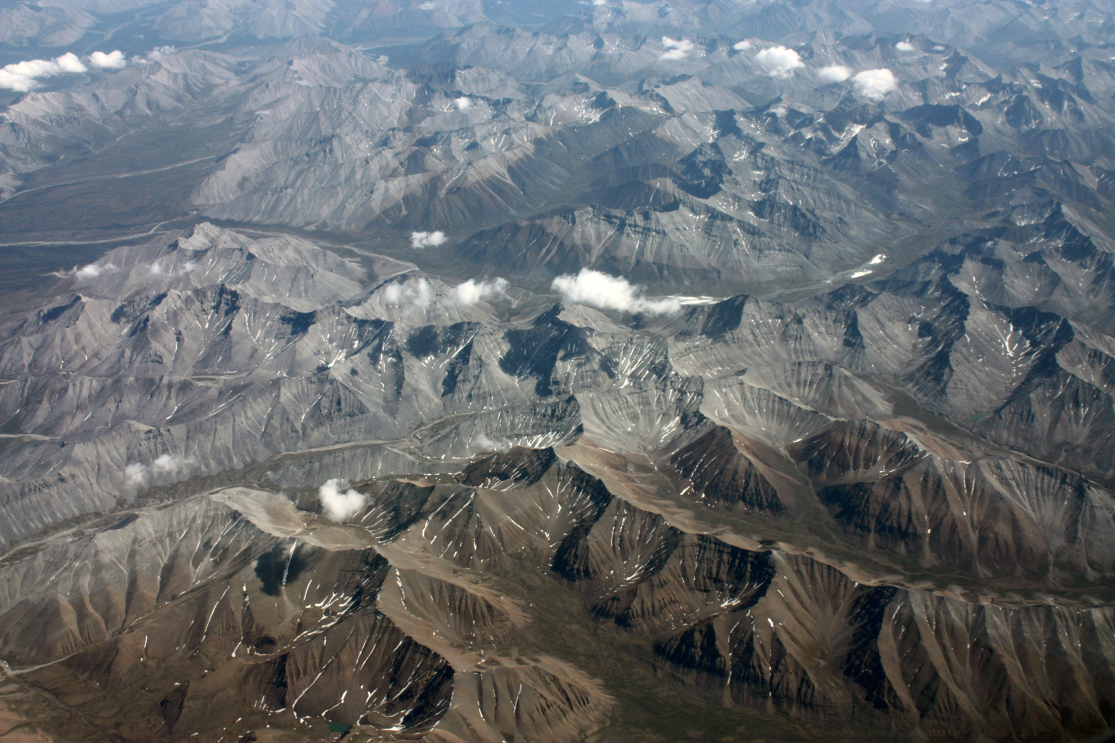 Aerial photograph of the Mackenzie Mountains in the Yukon Territory ...