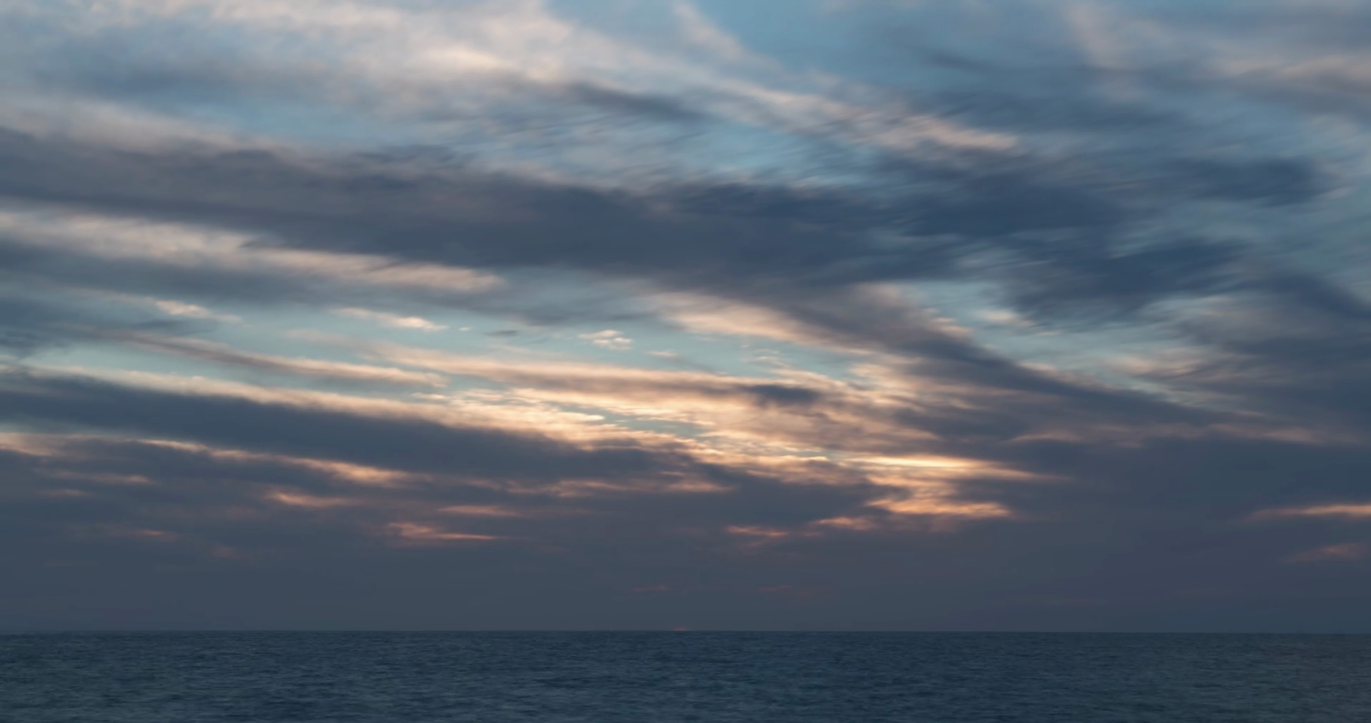 Time lapse of late afternoon clouds over the Pacific Ocean as day ...