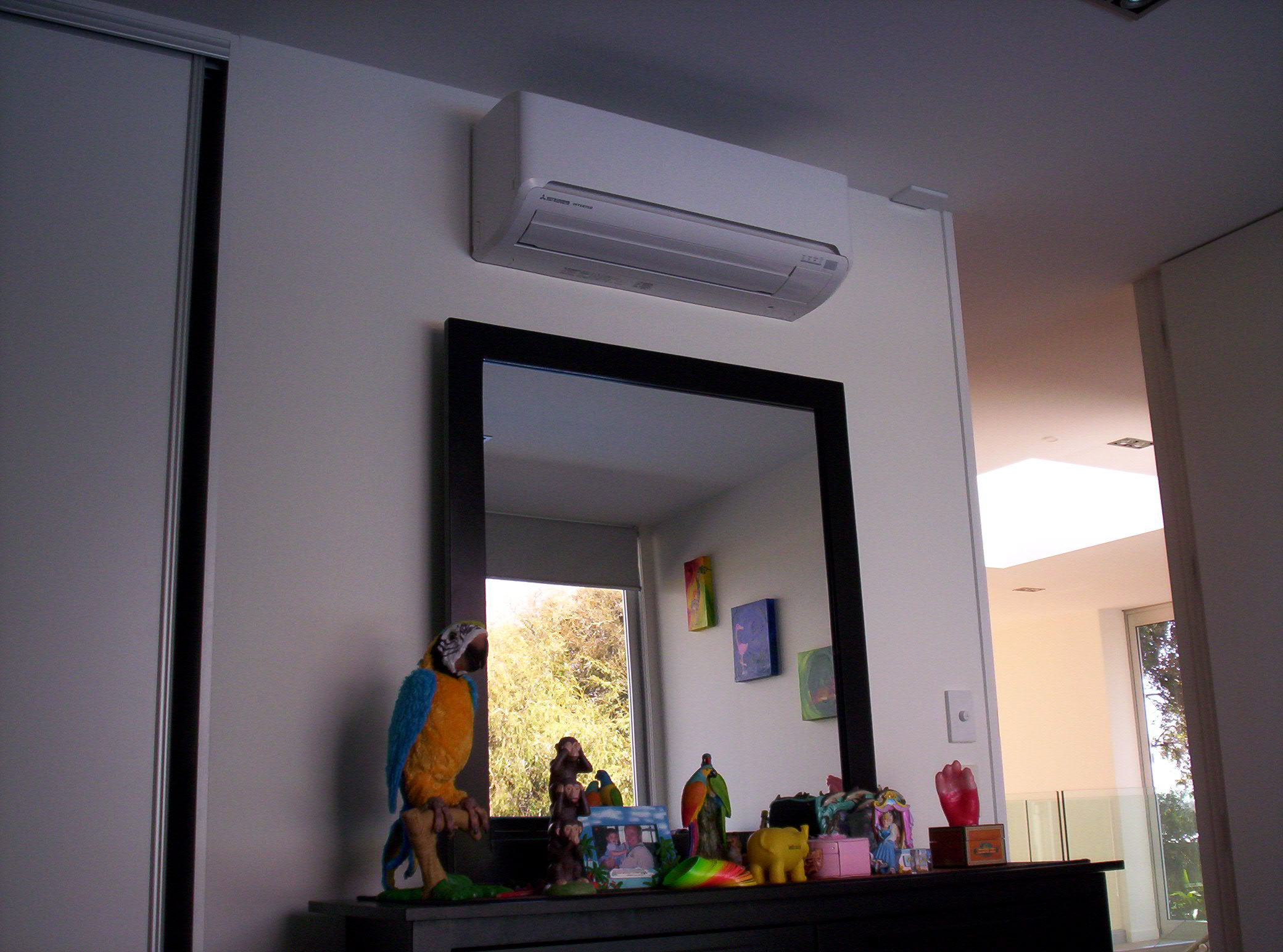 Air conditioner above cabinet photo