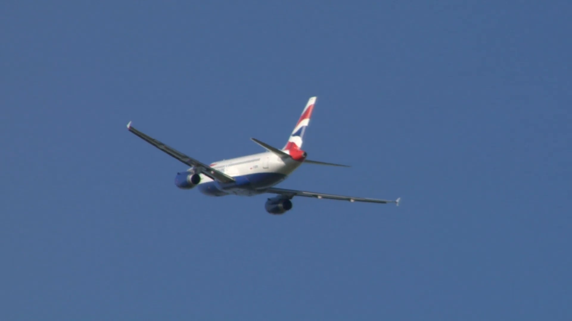 An aircraft flying away Stock Video Footage - VideoBlocks