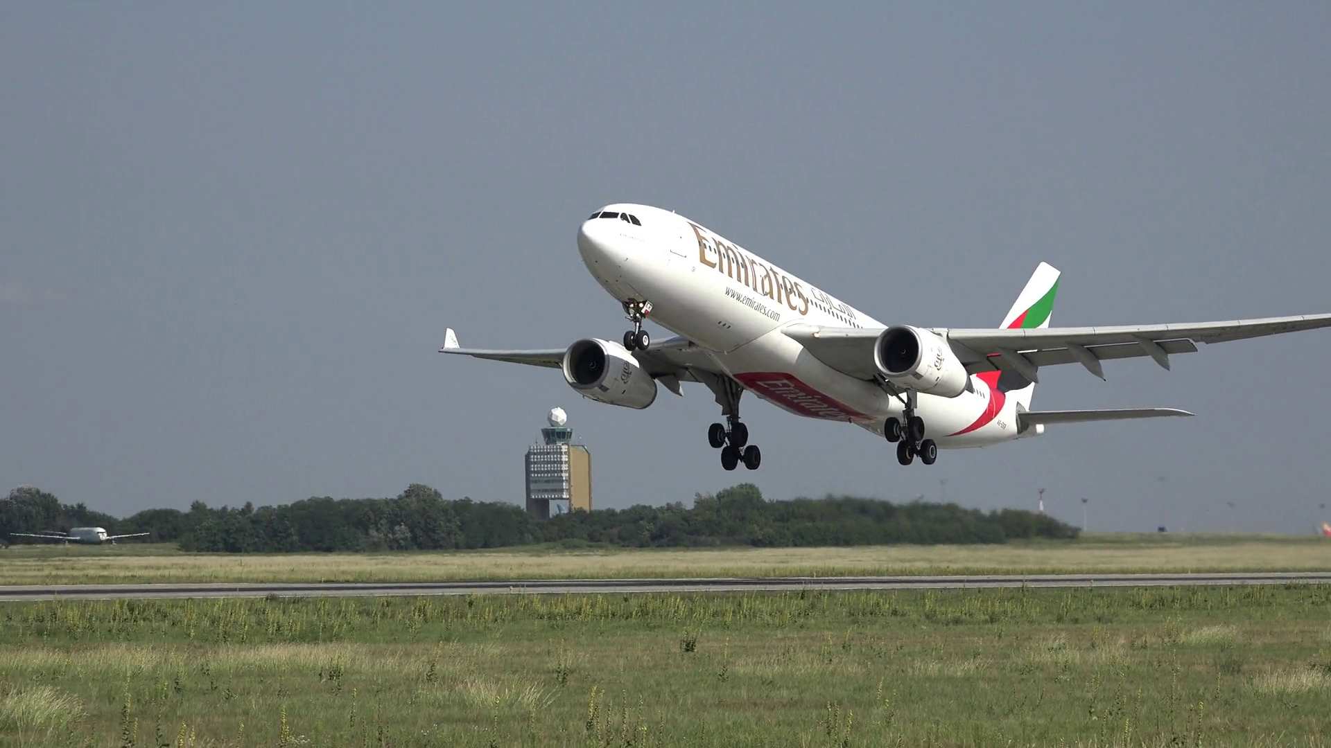 emirates airplane take off, from side view Stock Video Footage ...