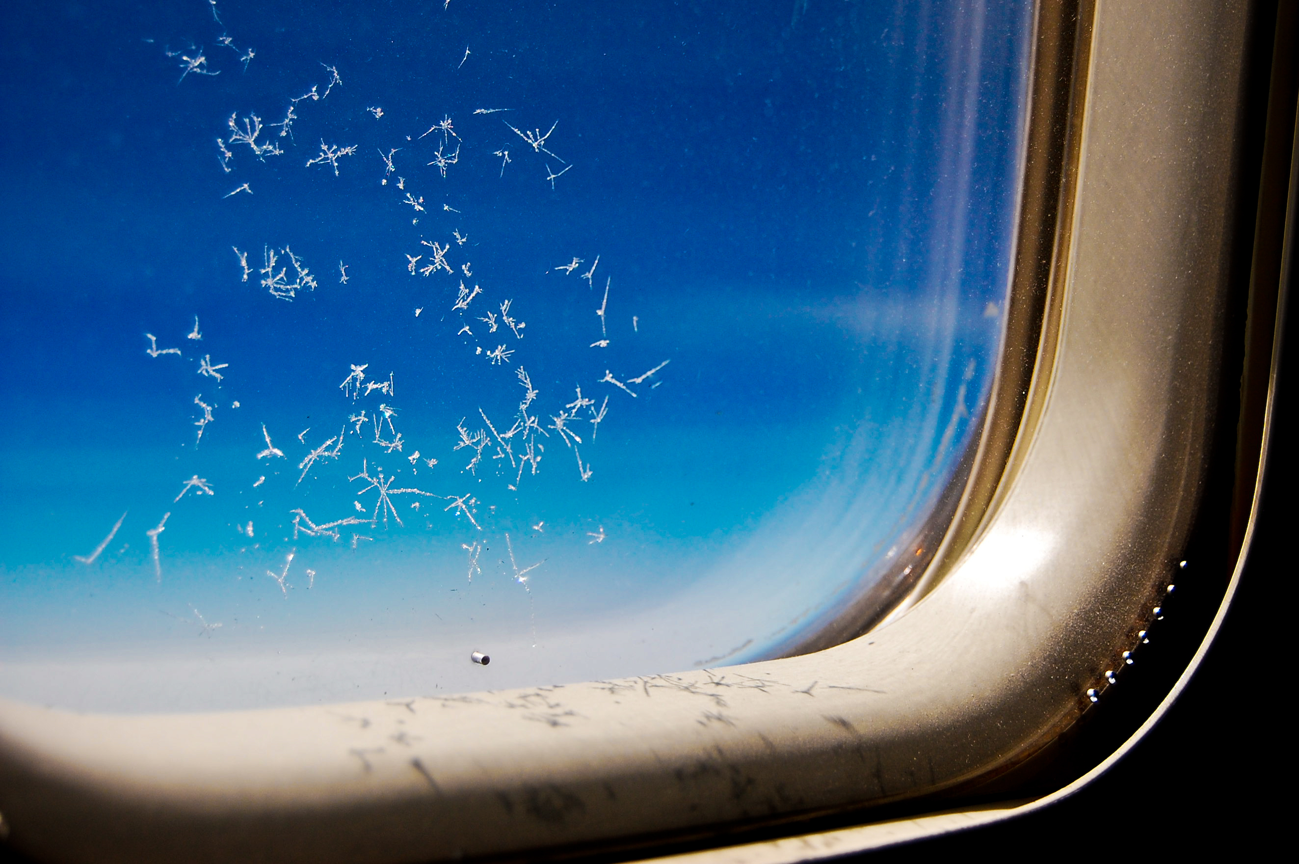 Why Do Airplane Windows Have a Little Hole? | Time