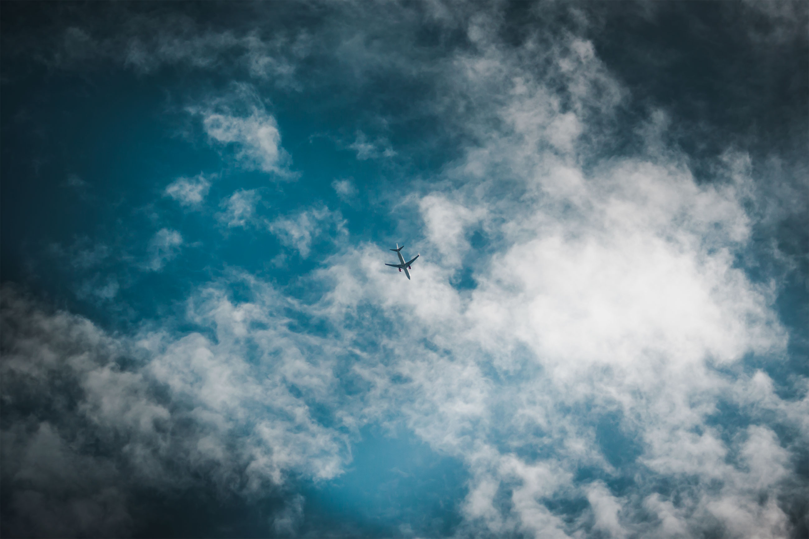 Airplane in the clouds photo