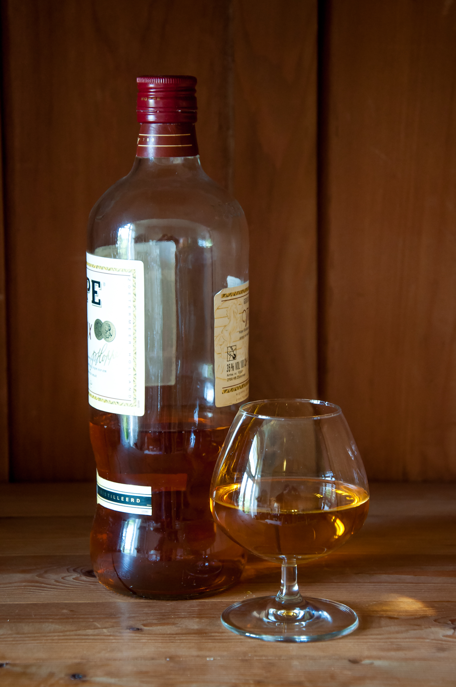 Alcohol glass and bottle, whisky, brandy photo
