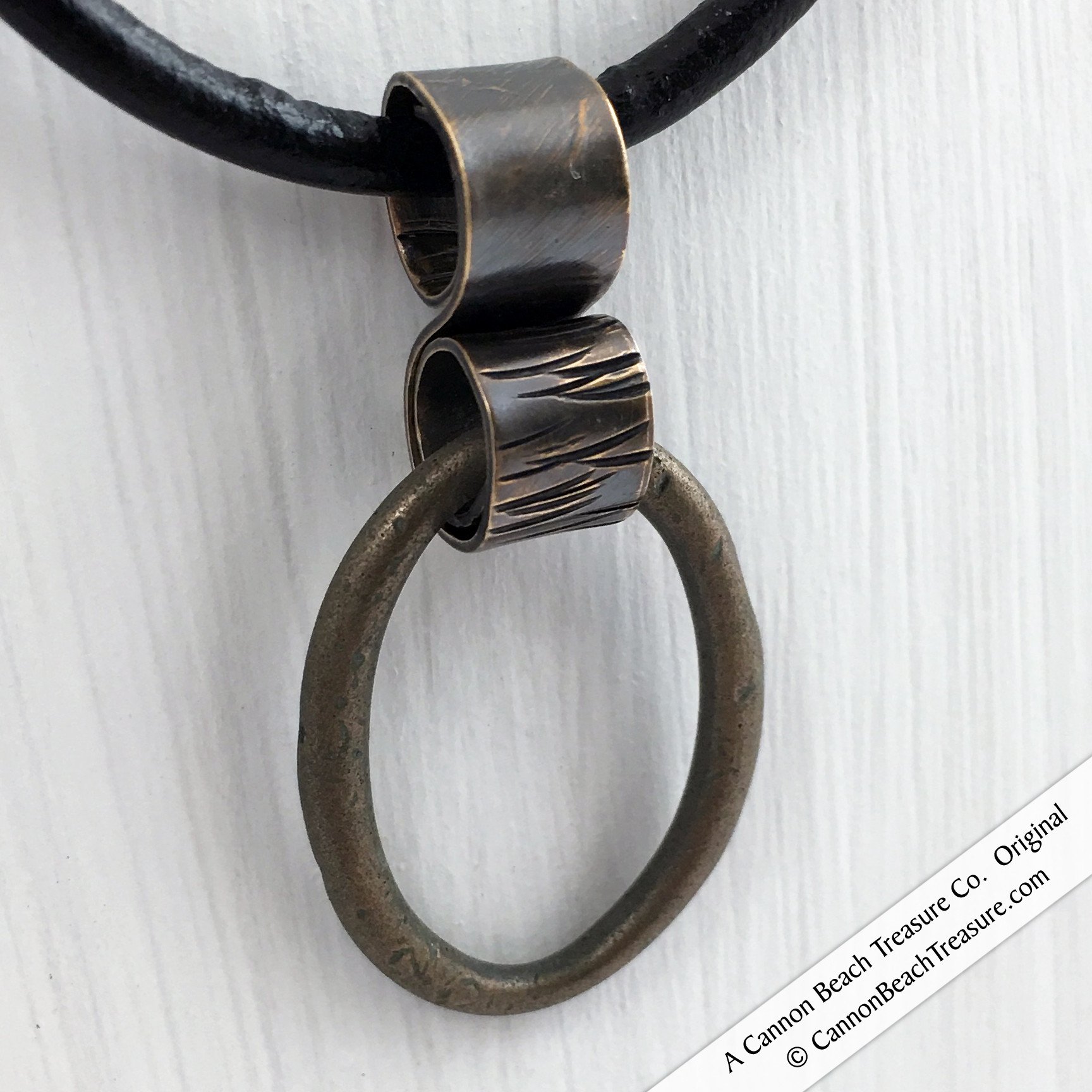 Shade of Bronze Celtic Ring Money Ancient Anvil Pendant - Cannon ...