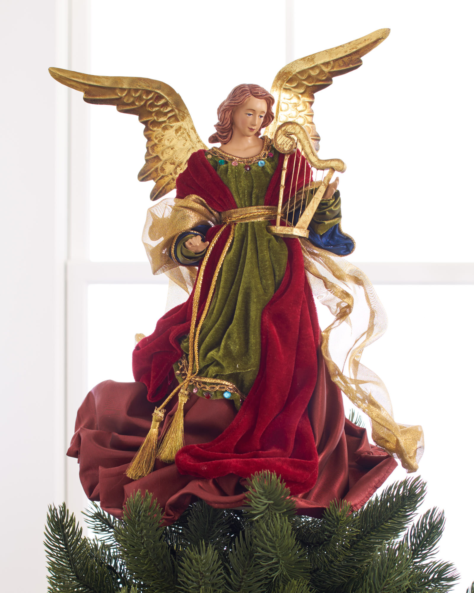Balsam Hill's Christmas Angel Tree Topper captures the essence of ...