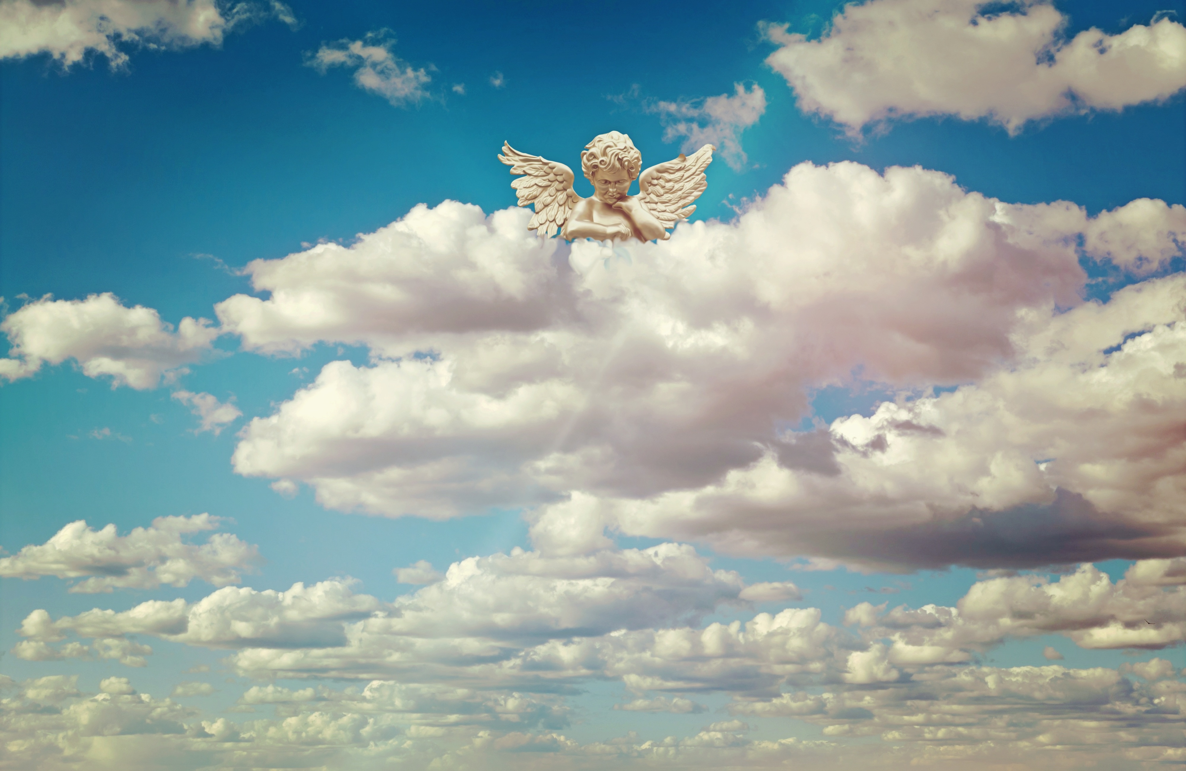 Angel in the clouds photo
