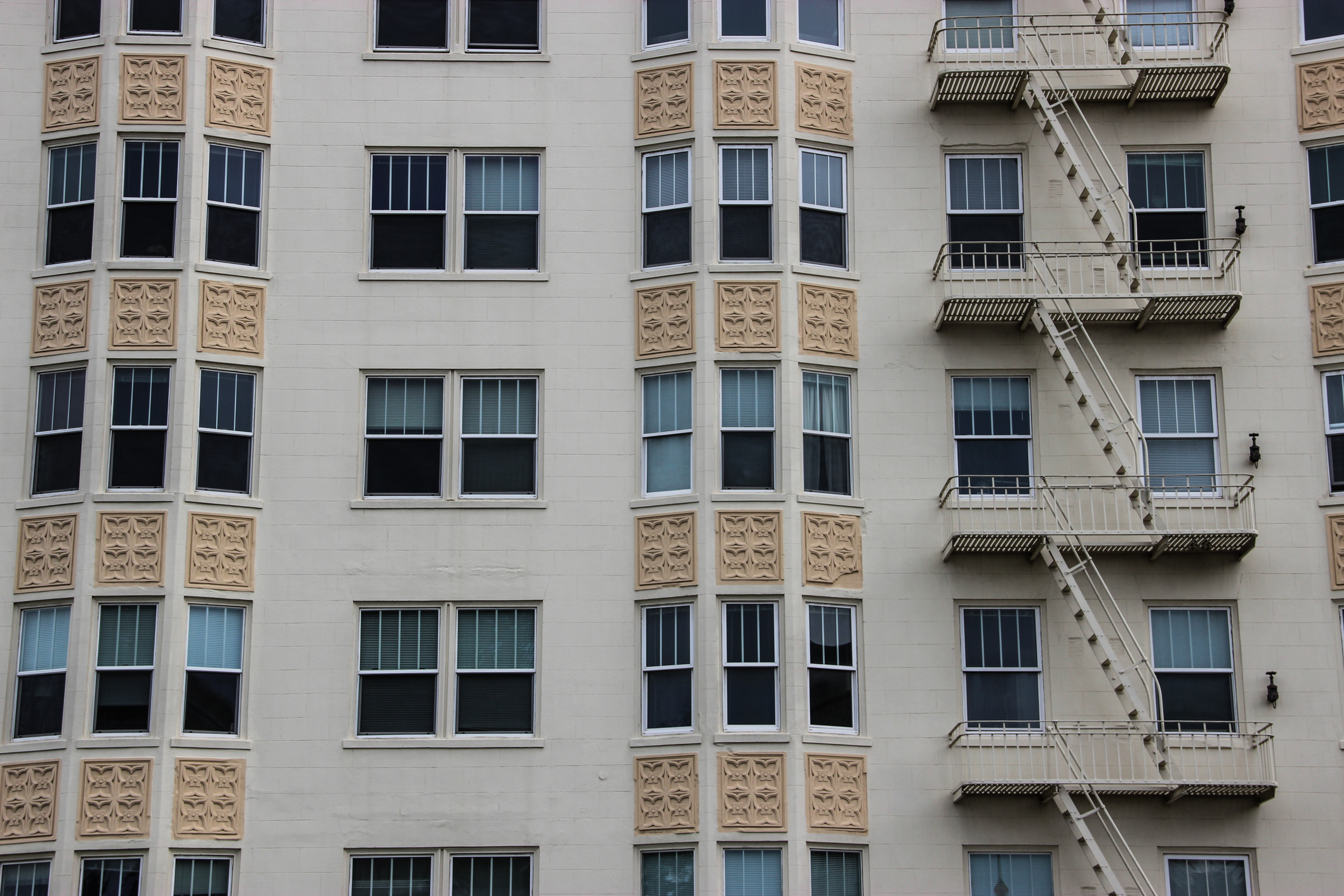 Free Stock Photo of Windows & Fire Escapes on Apartment Building