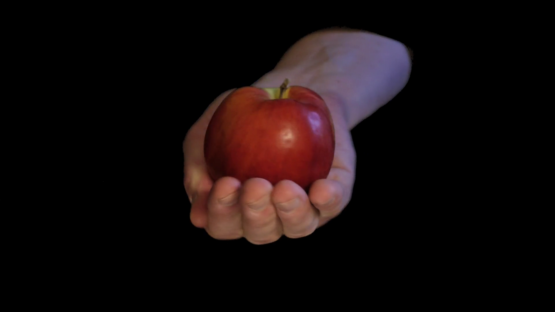 Original sin interpretation with apple in hand on black background ...