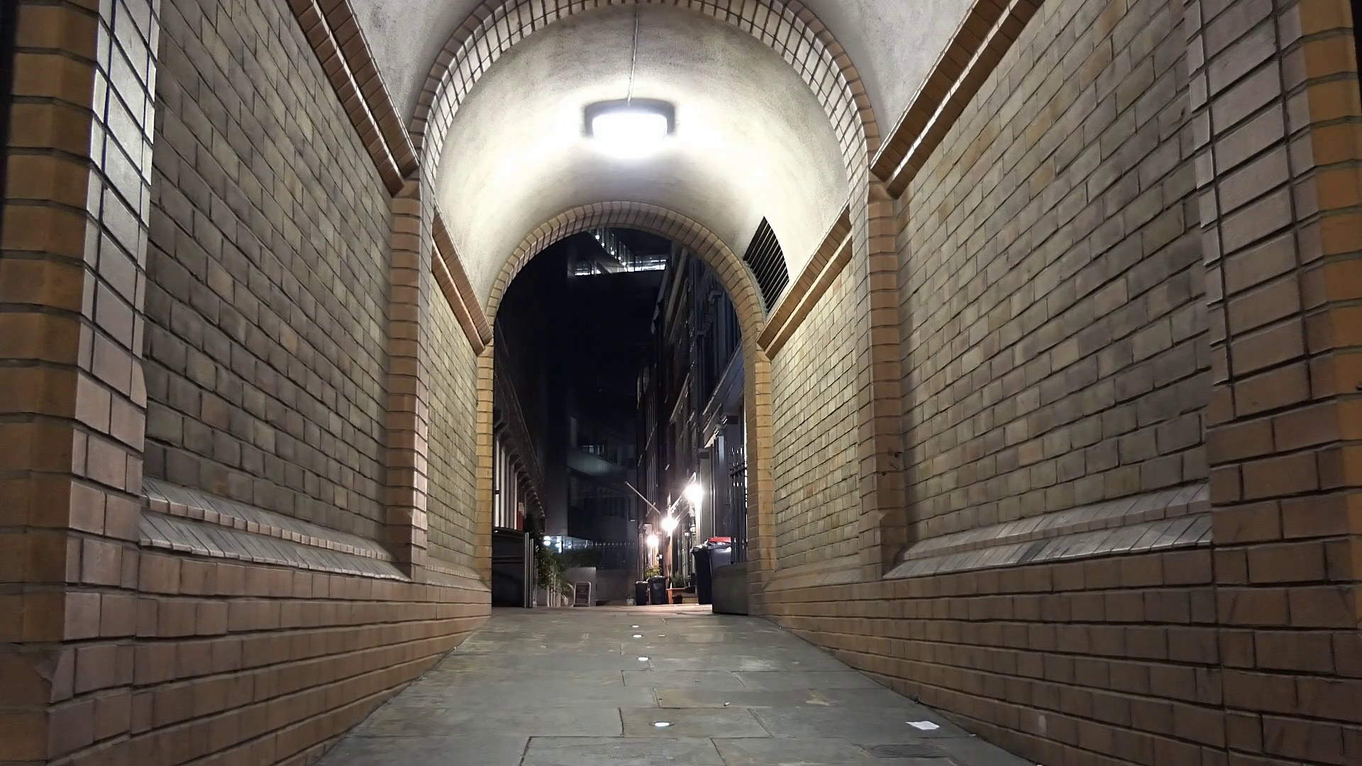 Arched corridor on a narrow street. London at night. Stock Video ...