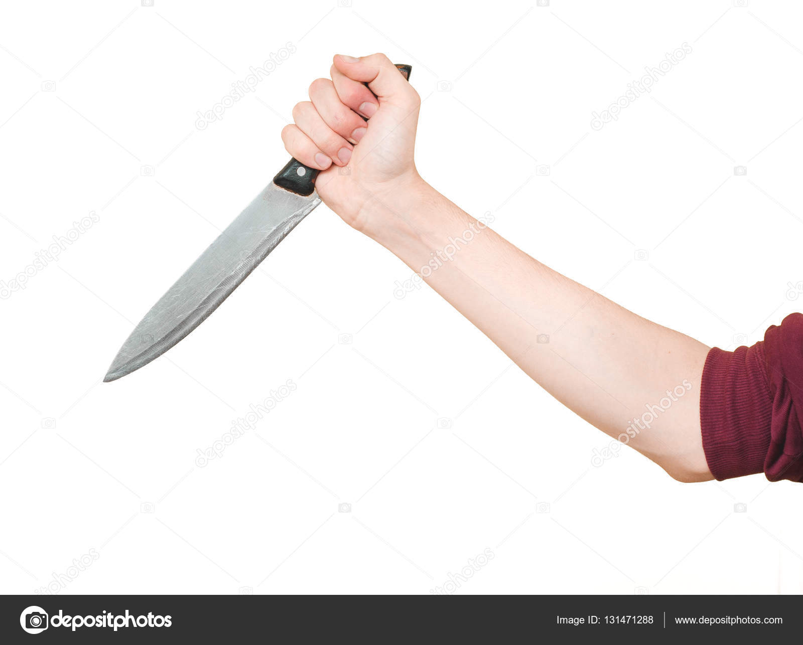 Male arm holding big large sharp kitchen knife in threatening ...