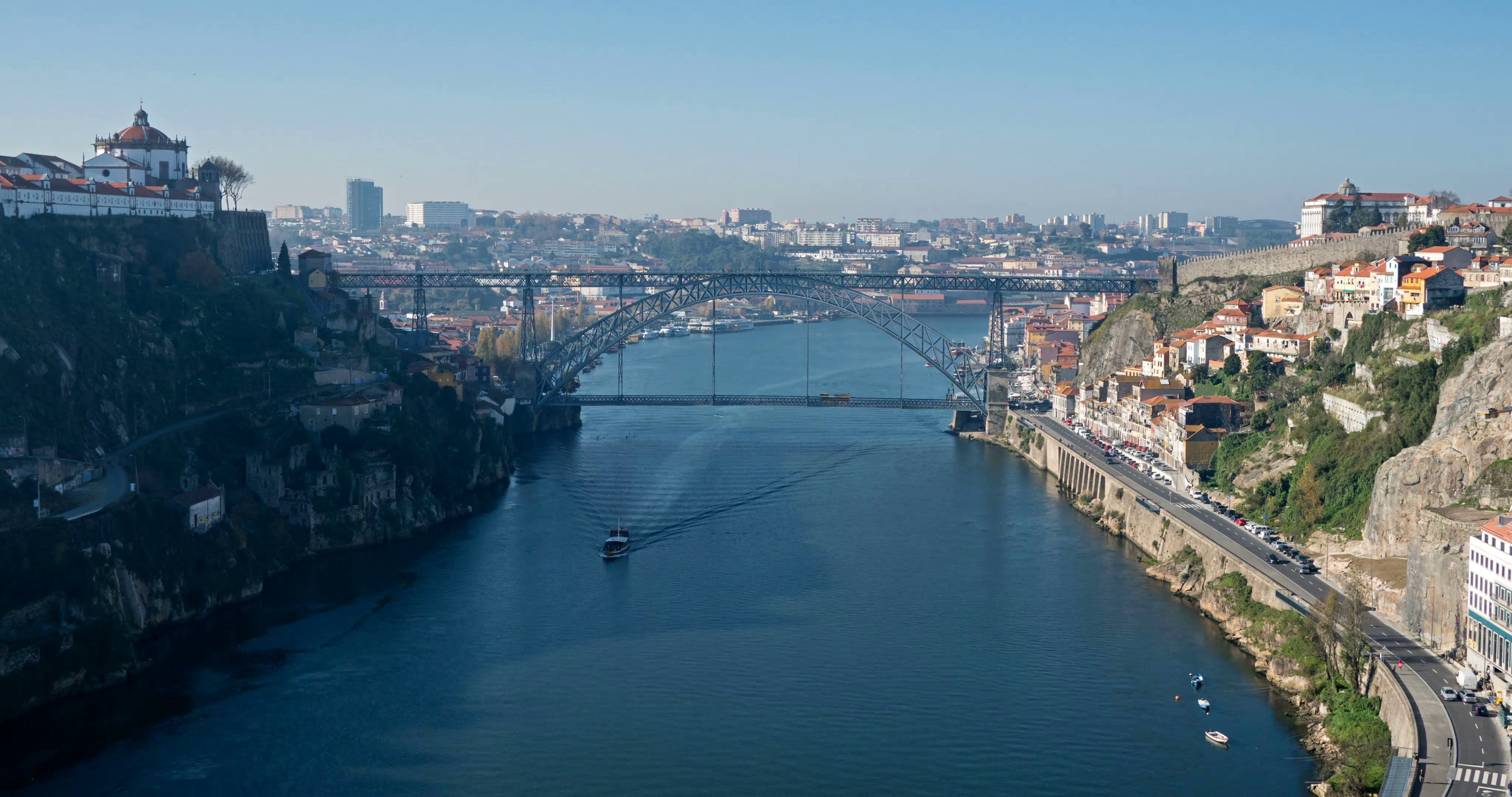 Arrabida bridge and river traffic, Douro river, Porto, Portugal ...