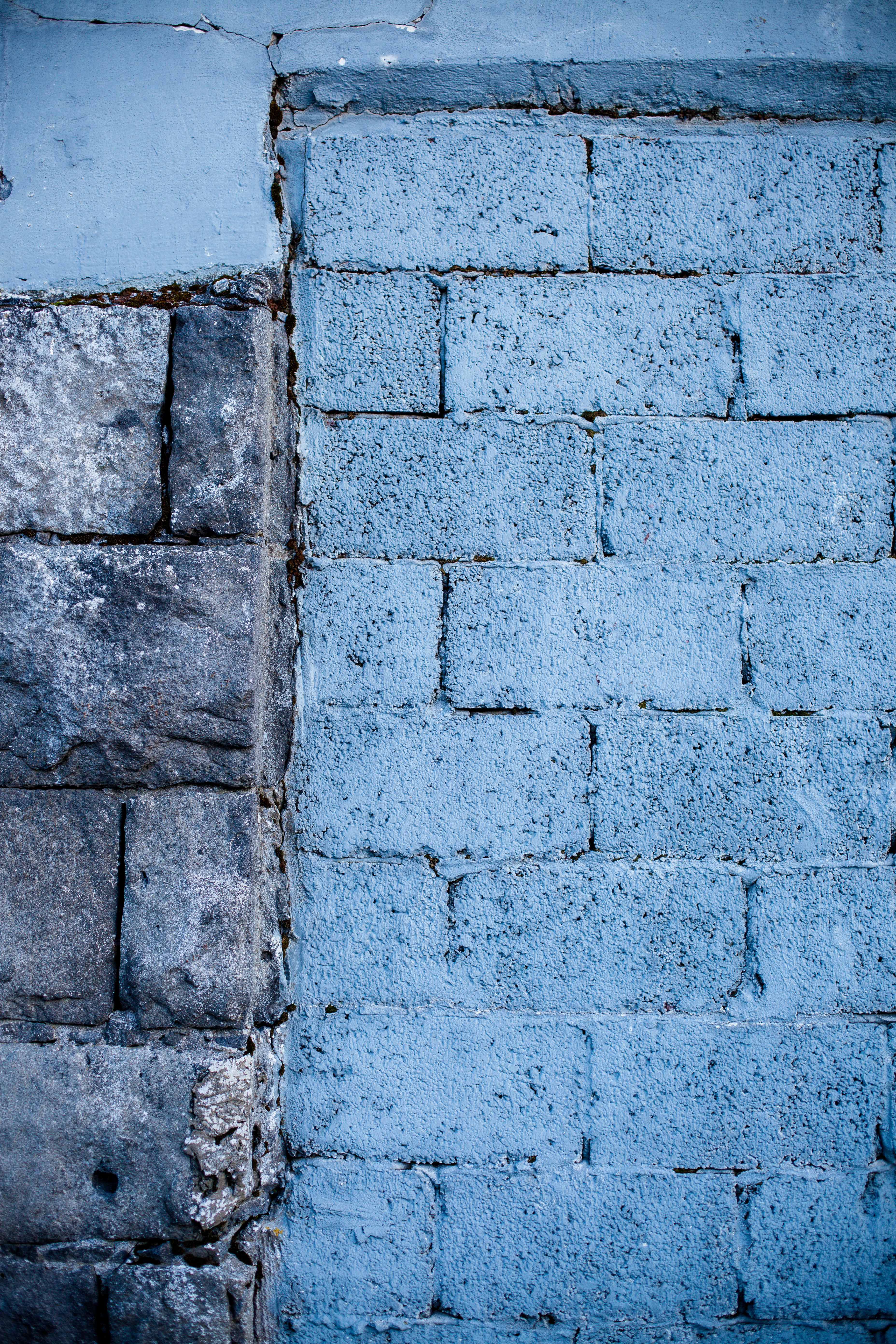 Ashlar stone wall and bricks photo