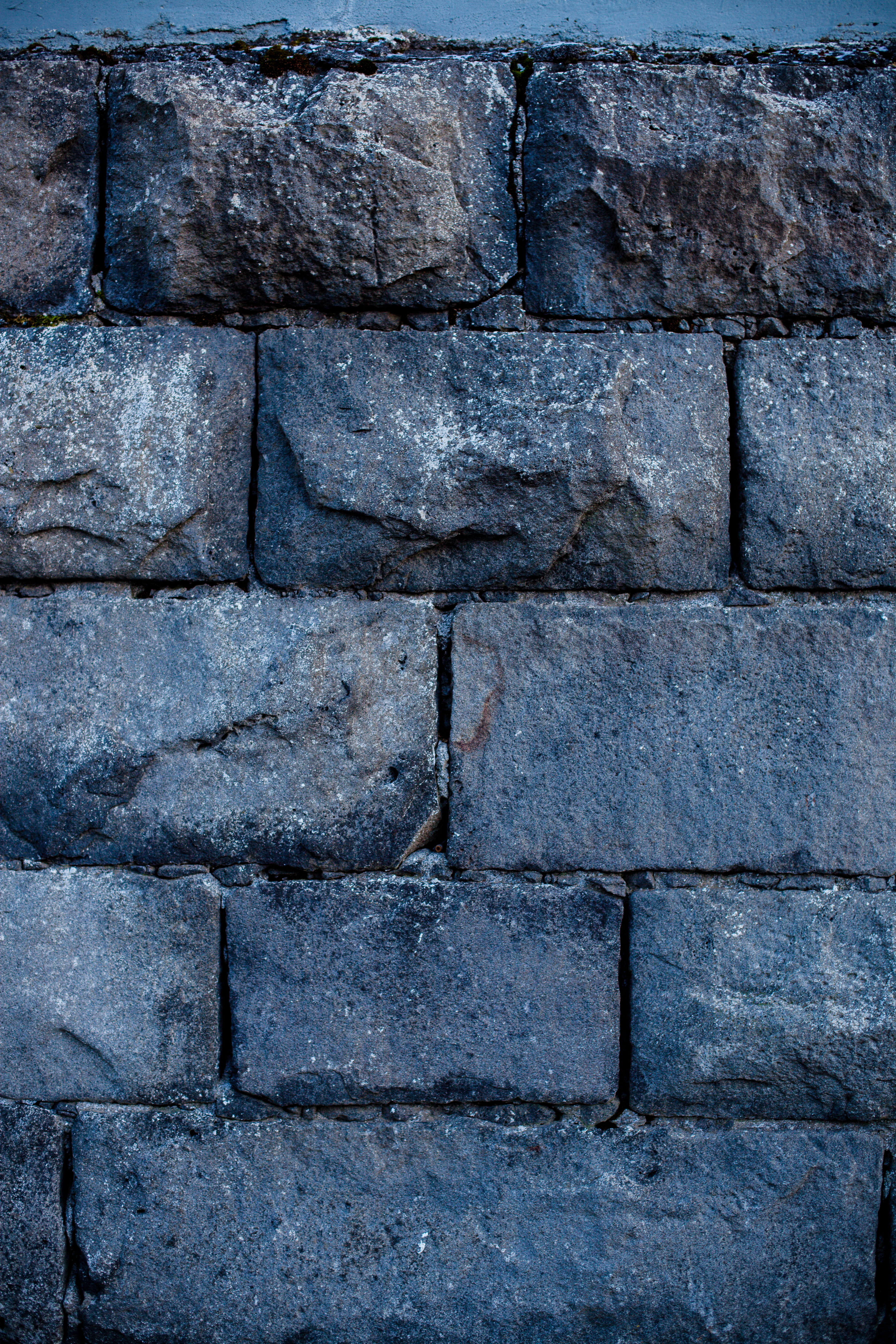 Ashlar stone wall surface photo