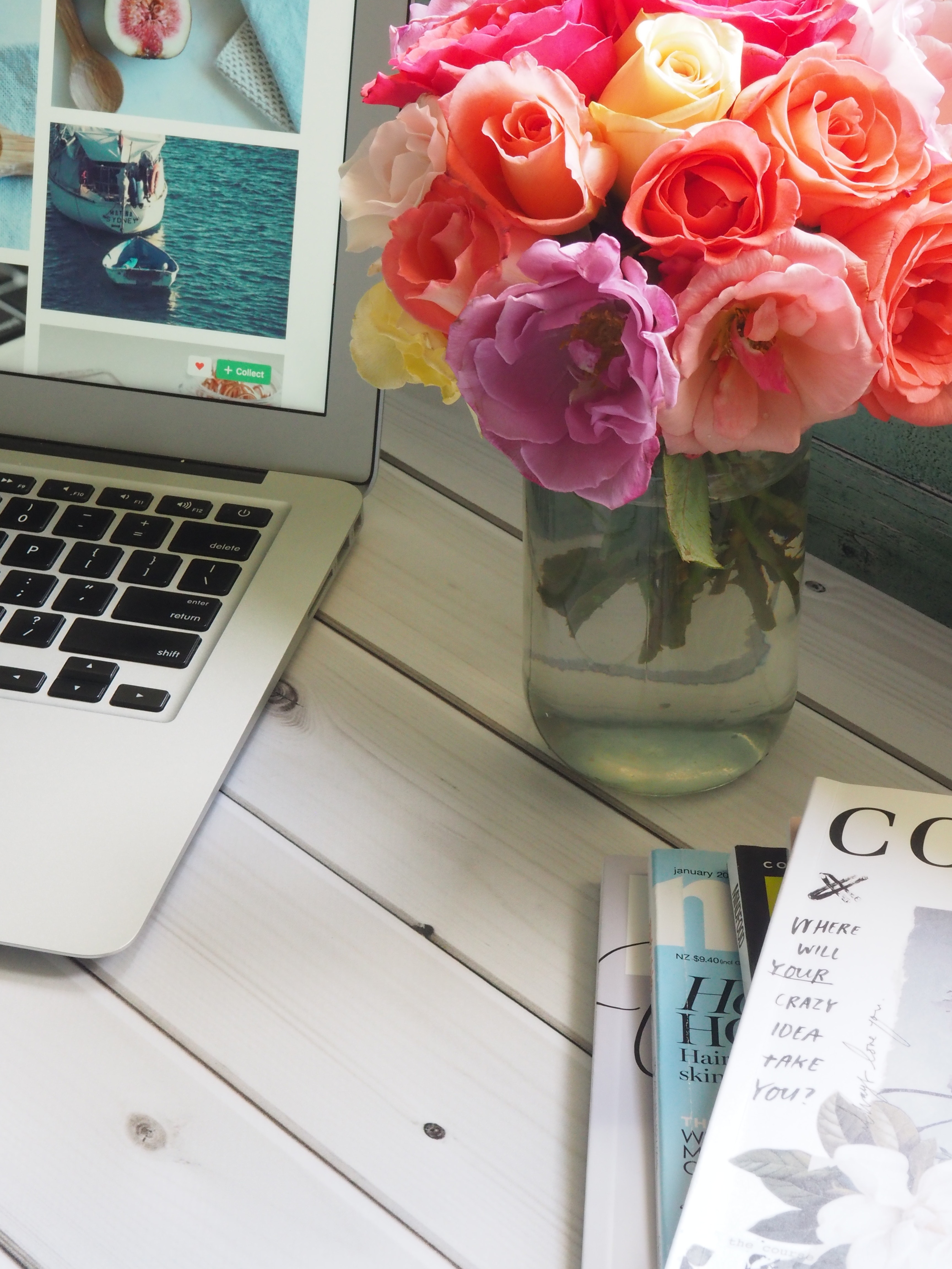 Assorted-color Flower Arrangement in Clear Glass Vase Beside a Laptop, Magazine, Working, Work, Vase, HQ Photo