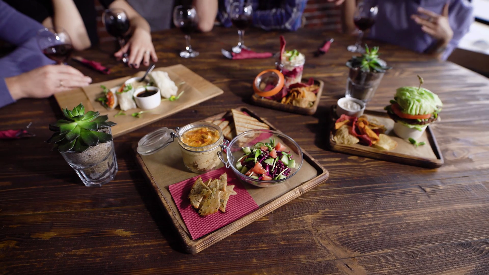 Close up of table served with assorted food setting on wooden ...