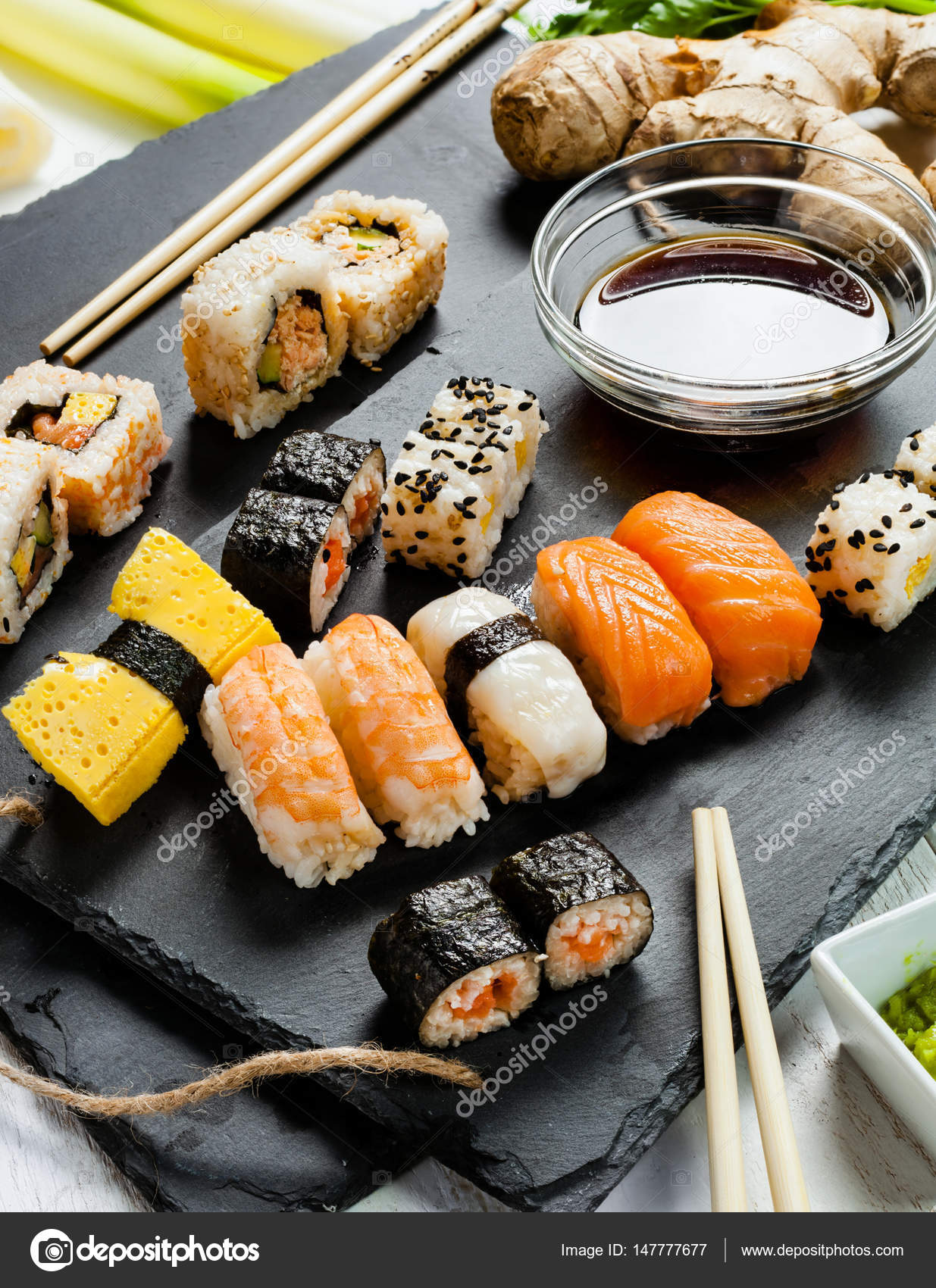 Slate tray of assorted sushi — Stock Photo © AntonioGravante #147777677