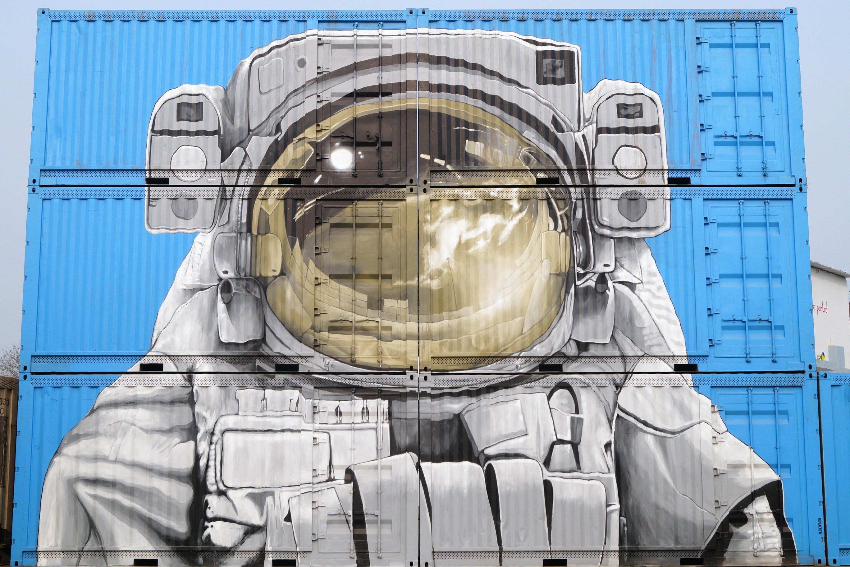Astronaut graffiti on semi-trailers photo
