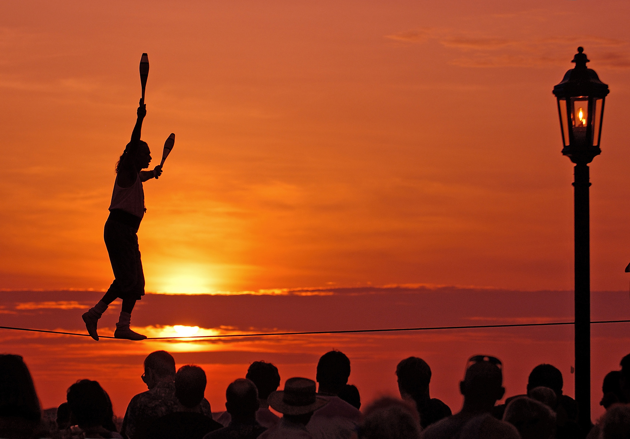 Photo #75988: Tightrope Walker at Sunset Celebration | America's Byways