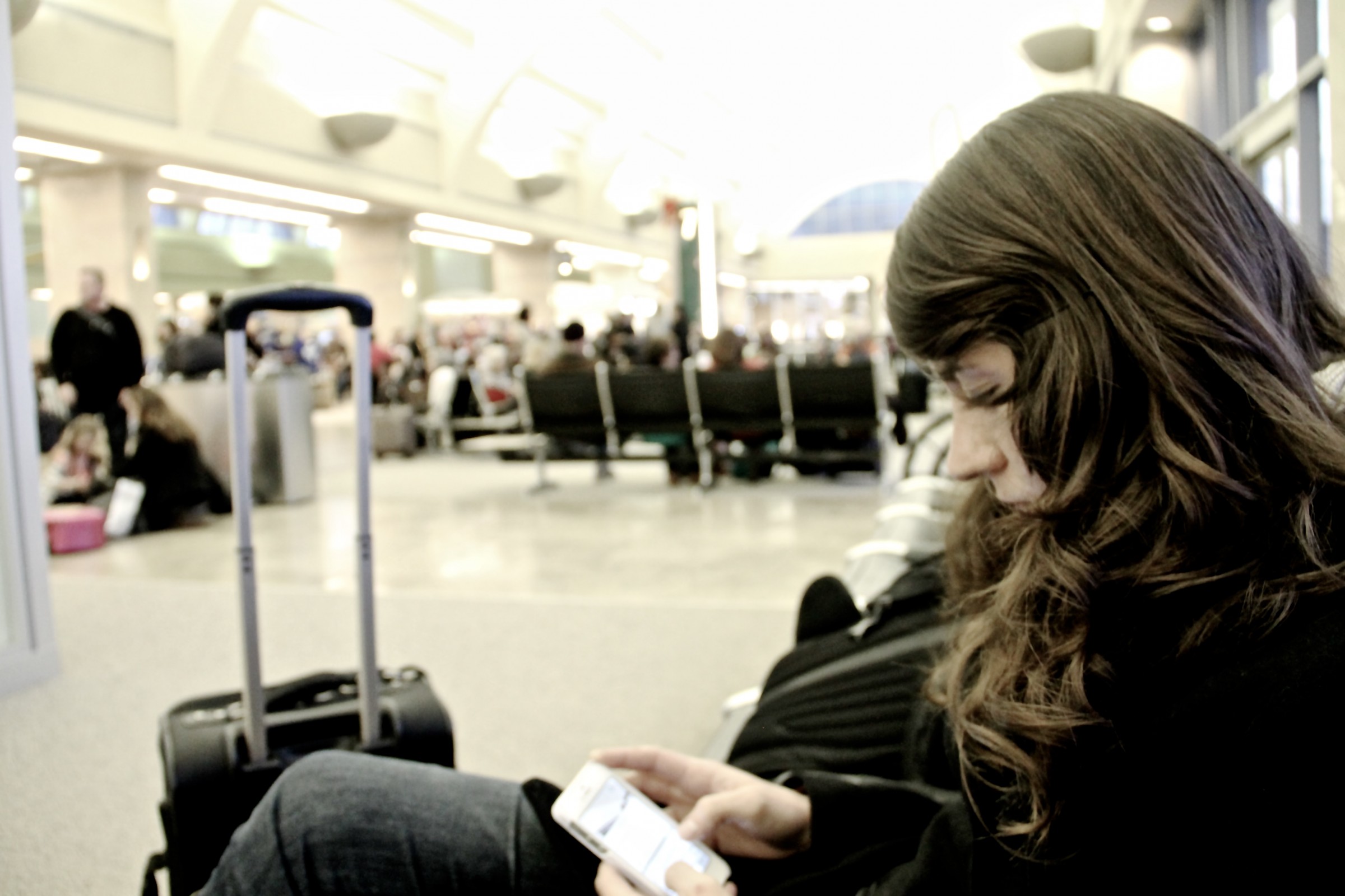 Free Stock Photo of Woman Waiting at the Airport