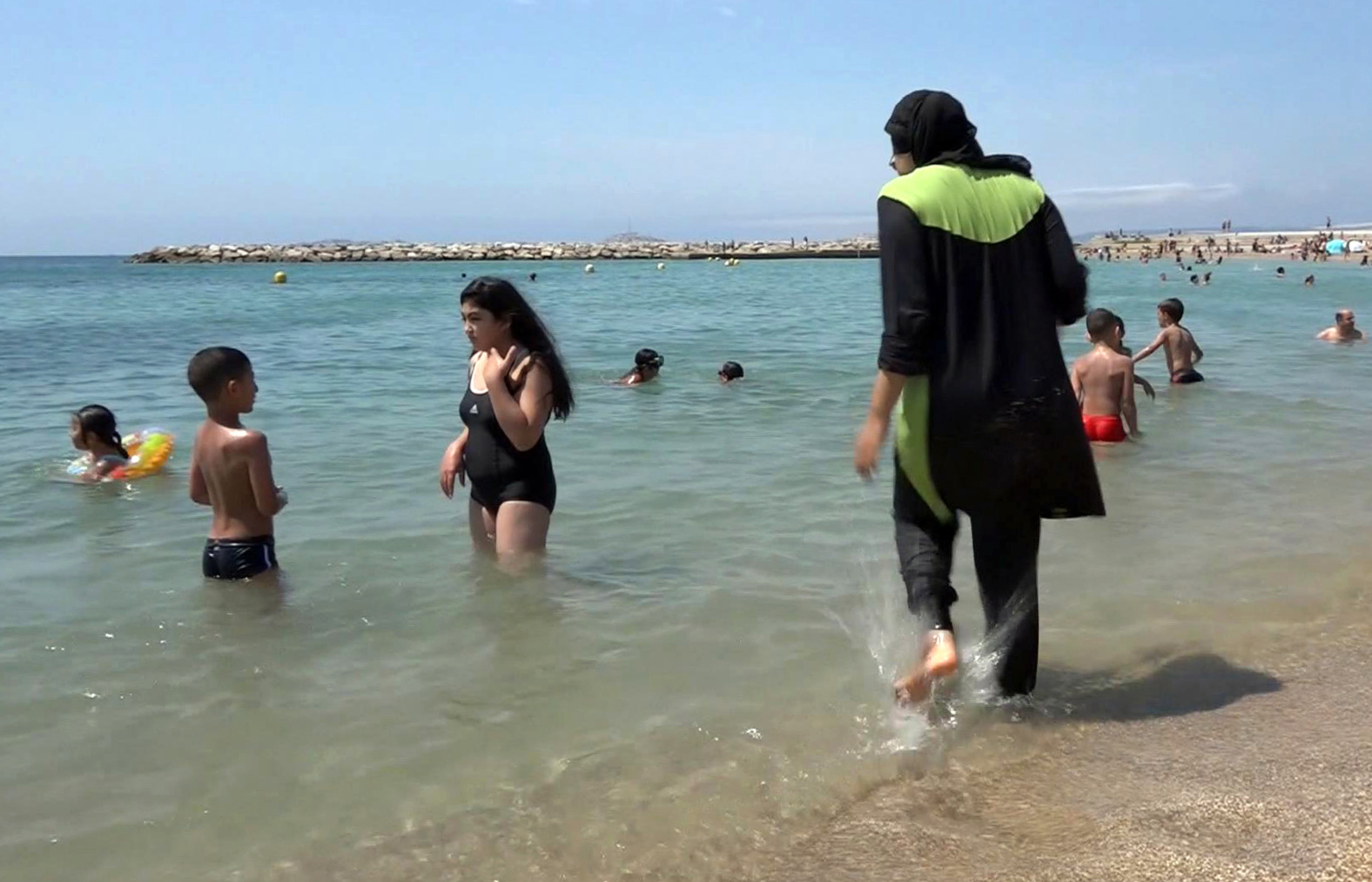 Burkini Ban Muslim Woman Forced to Remove Headscarf at Beach | Time