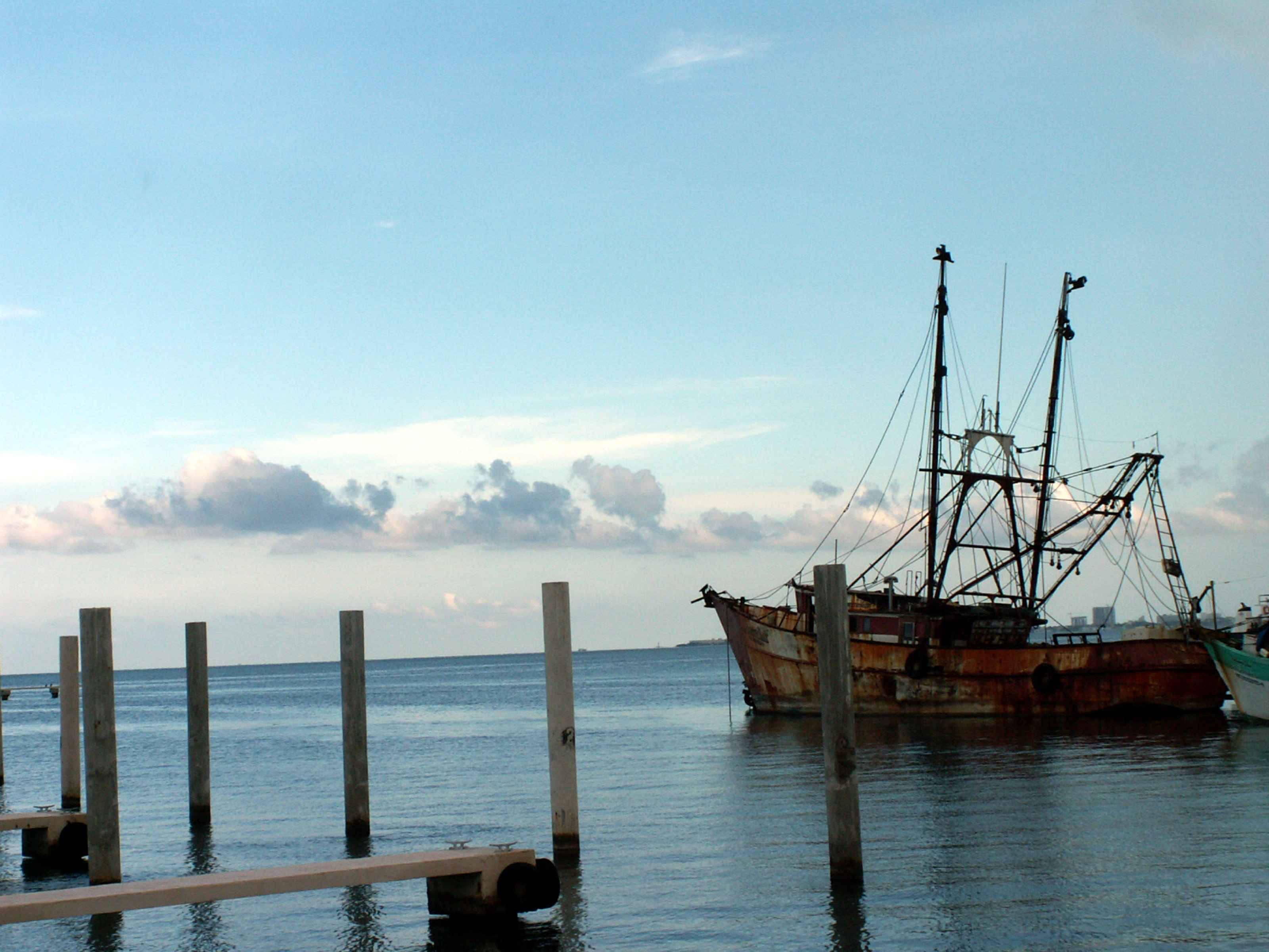 File:Old rusty fishing boat moored in the harbor.jpg - Wikimedia Commons