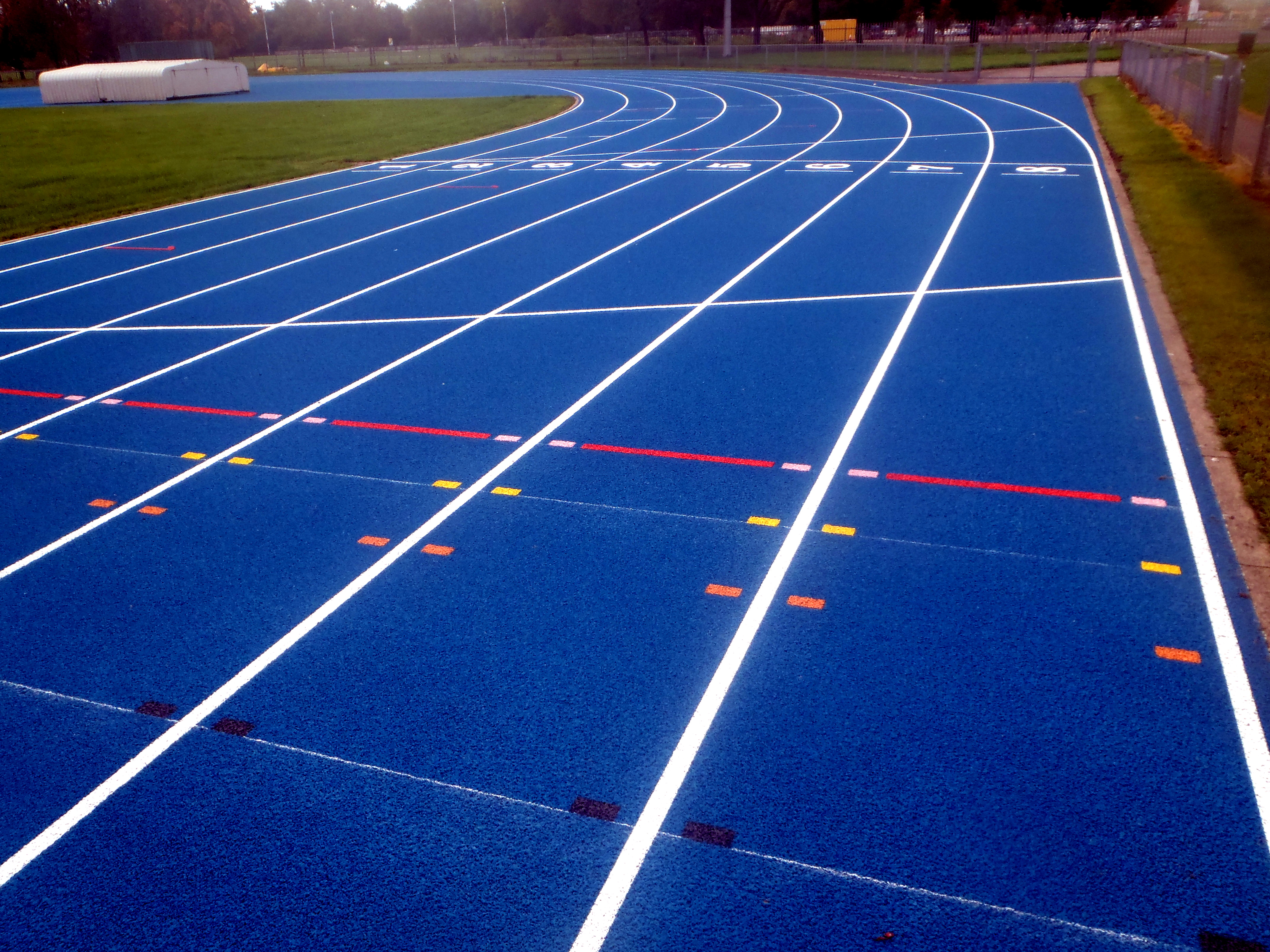 Are Athletics Running Tracks Always Red? - Sports and Safety Surfaces