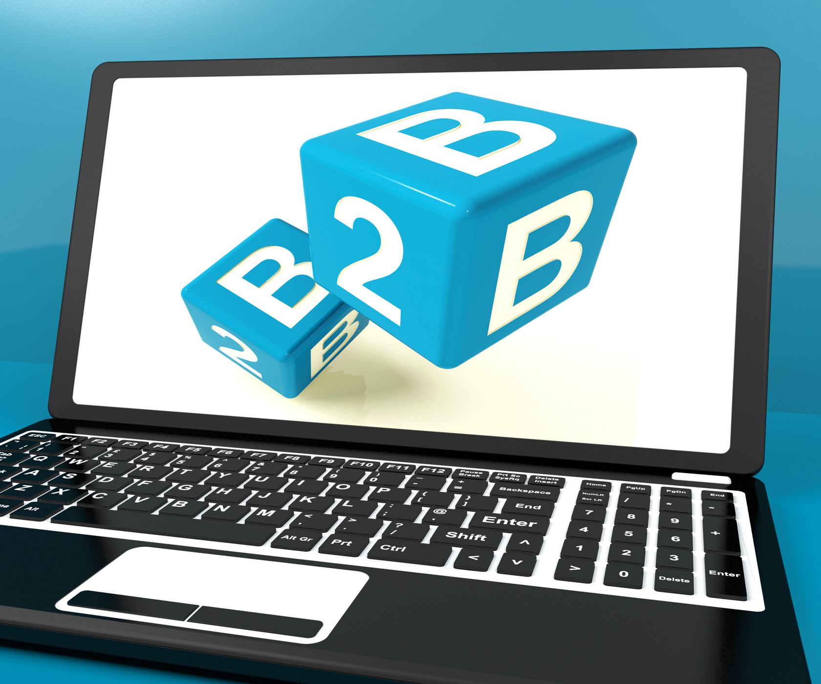 B2b dice on laptop computer shows business and commerce photo