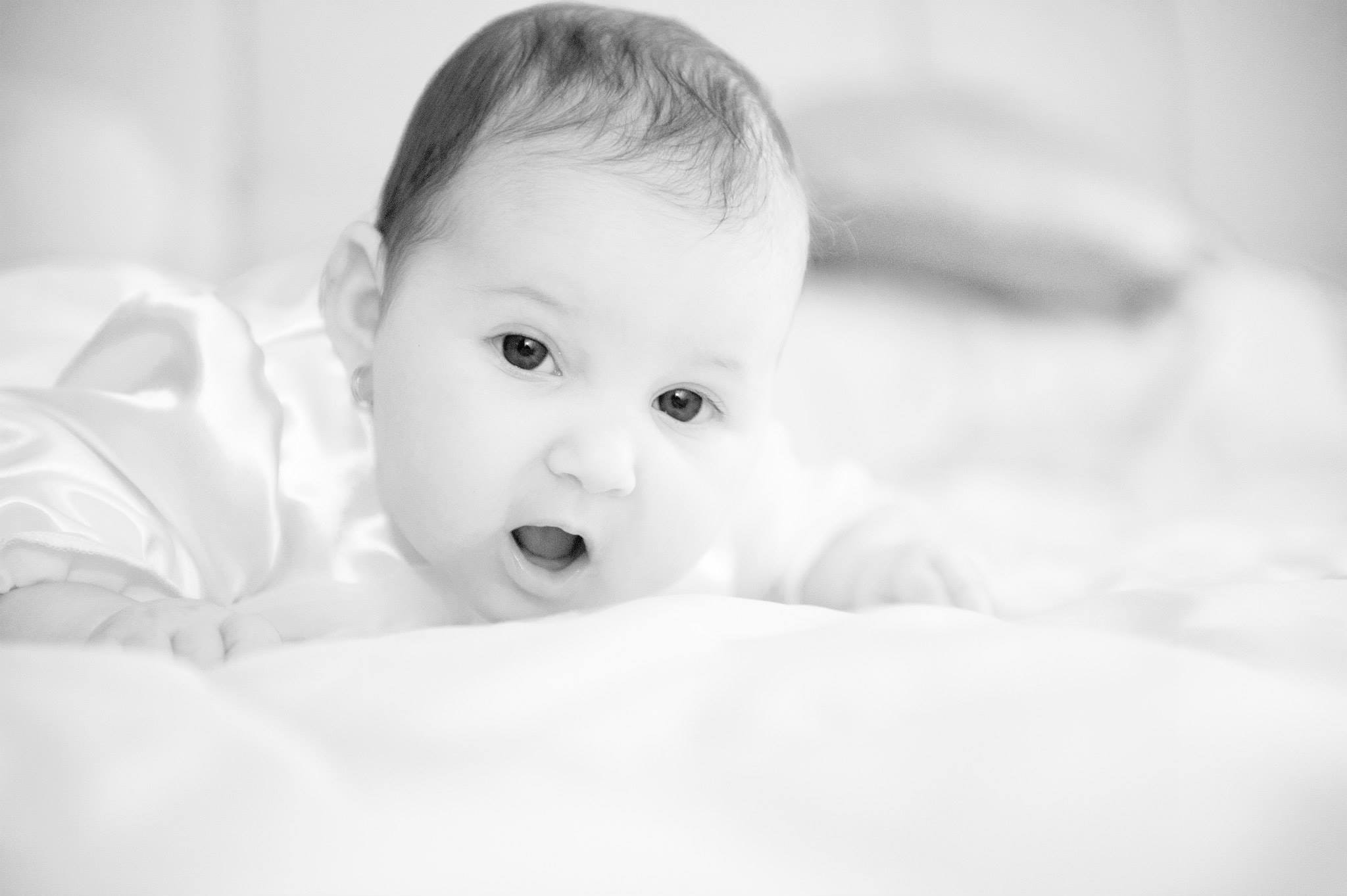 Baby Covered by White Towel Grayscale Photography · Free Stock Photo