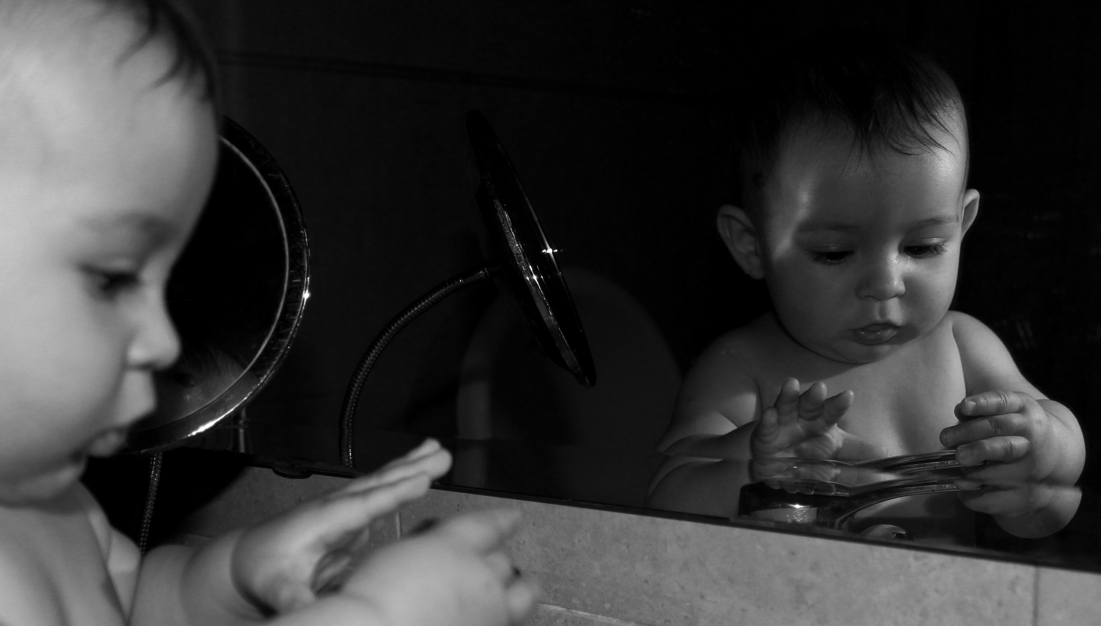 Baby in the mirror photo