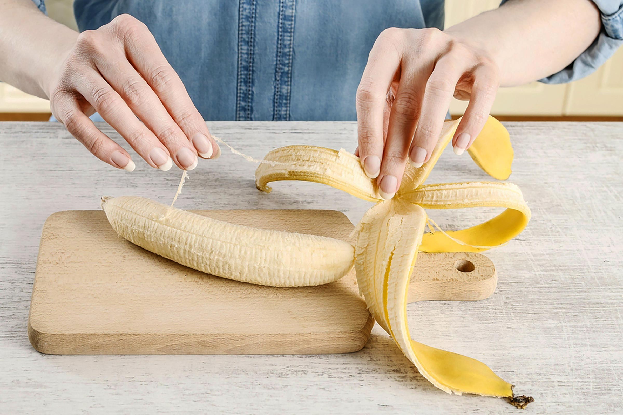 Why You Should Stop Throwing Out Banana Strings | Reader's Digest