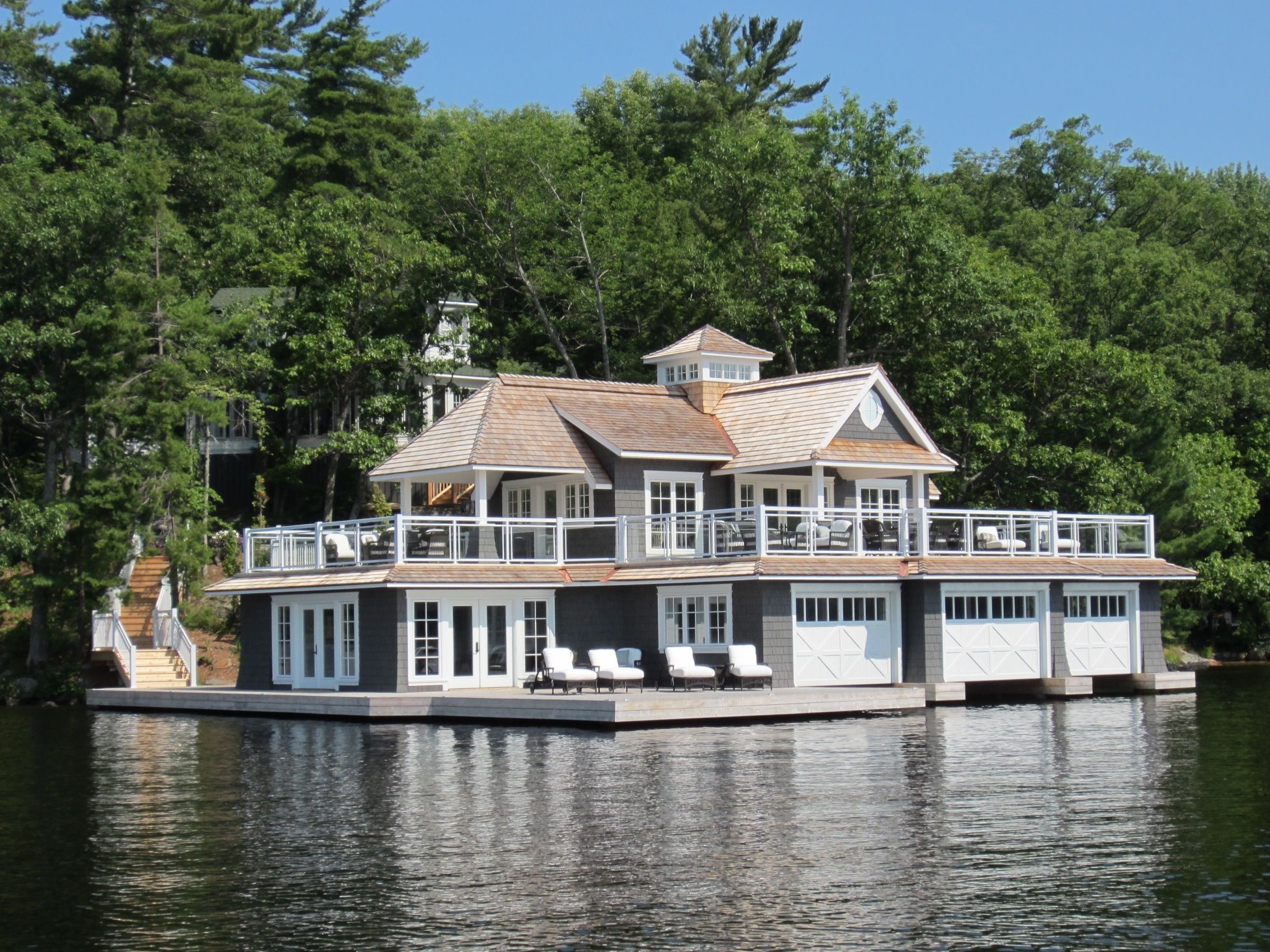 This is a beautiful boathouse on Muskoka Lakes, Ontario, Canada ...
