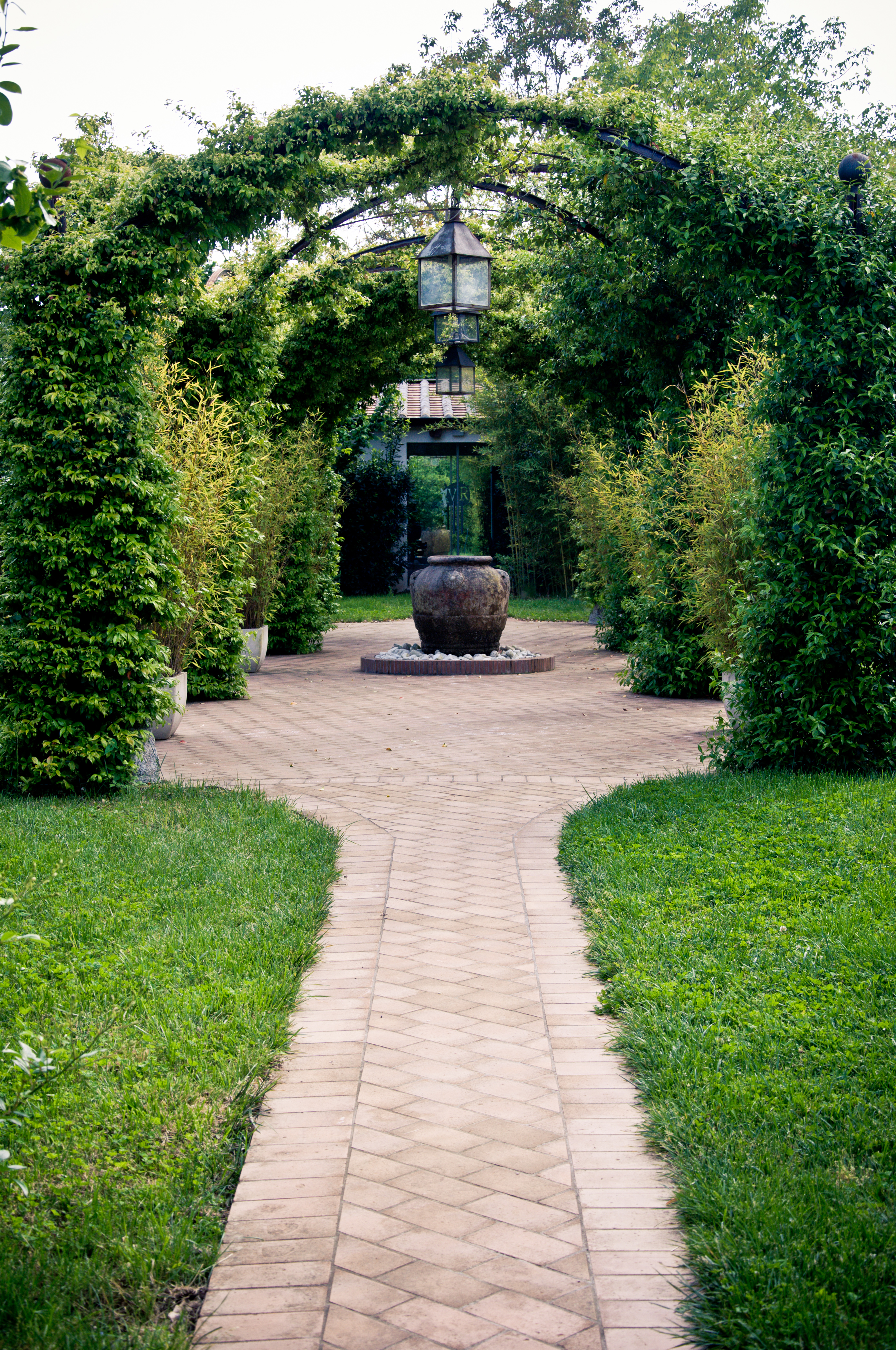 Beautiful garden arches and path photo