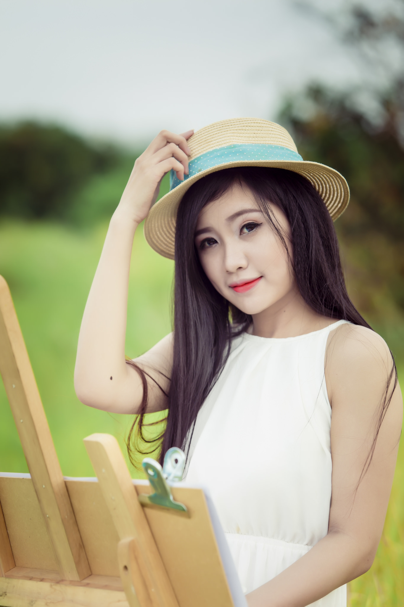 Beautiful girl in a meadow photo
